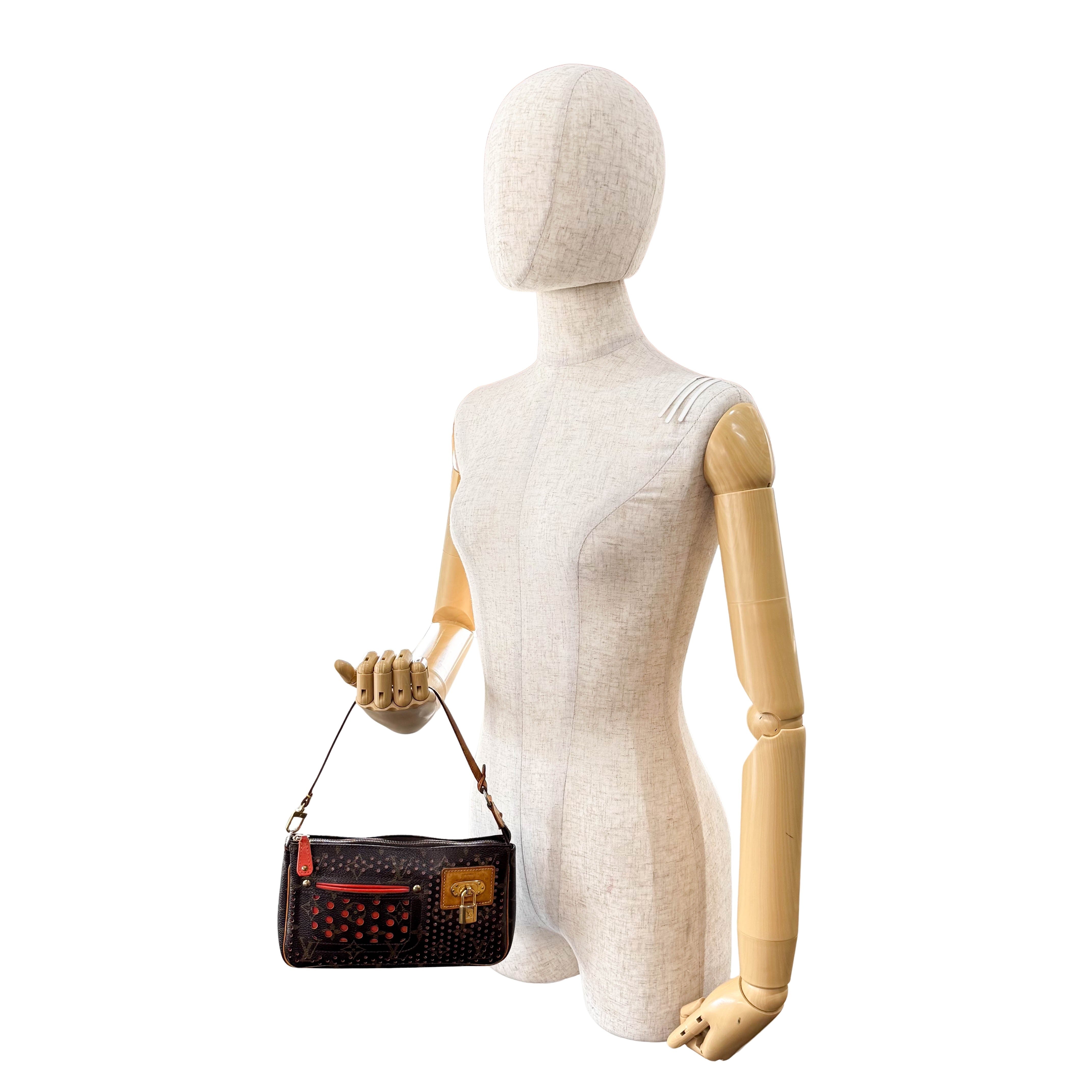 Monogram Brown Holes Leather Pochette Accesoire