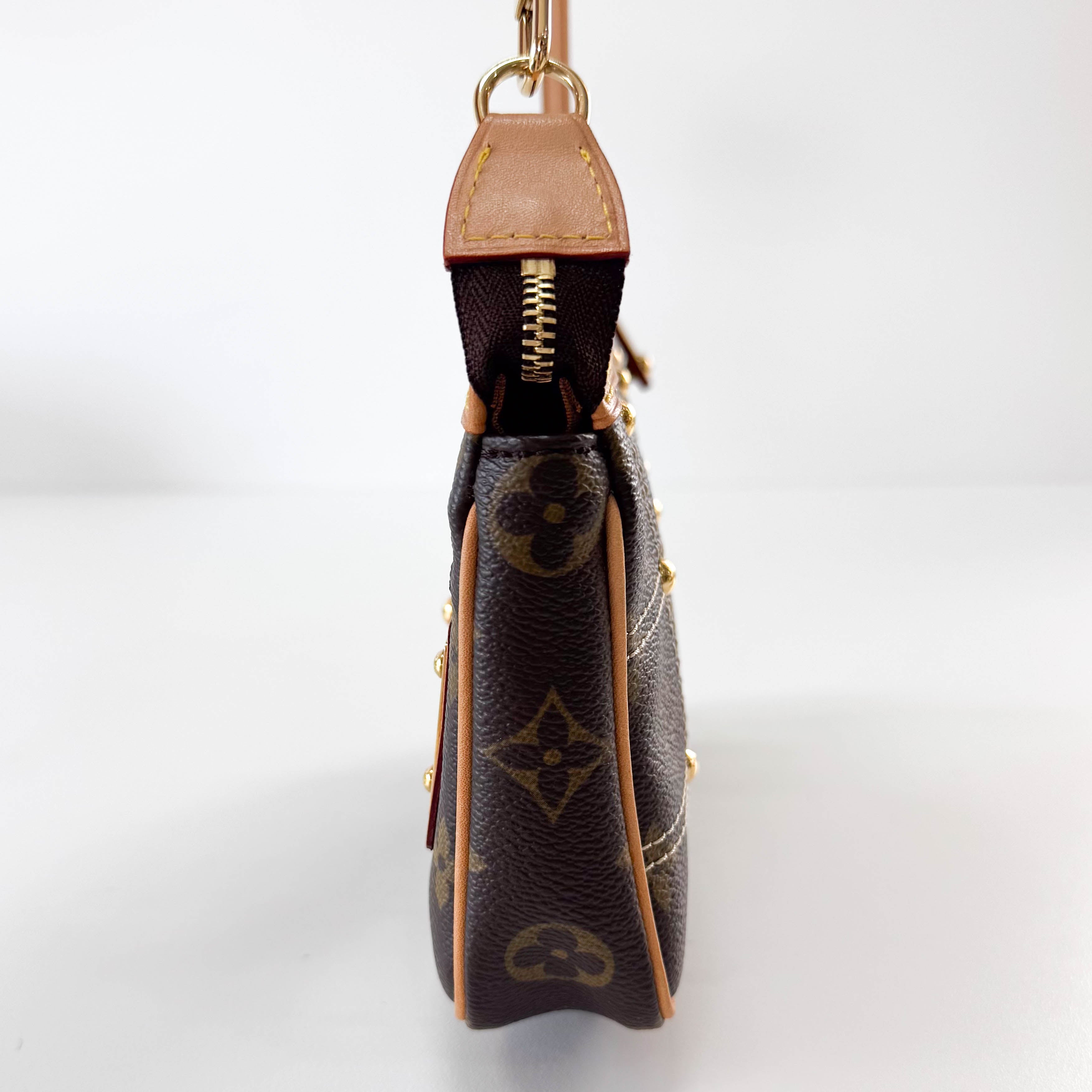 2007 Monogram Rivet Pochette Accessoires Handbag M40141