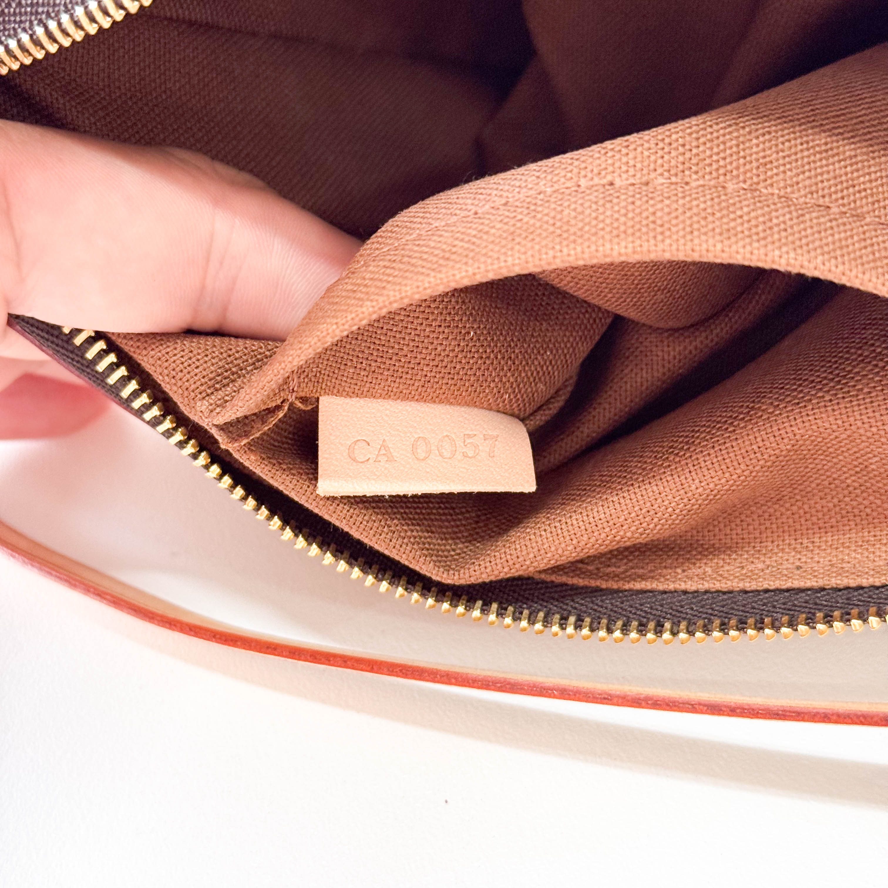 2007 Monogram Rivet Pochette Accessoires Handbag M40141