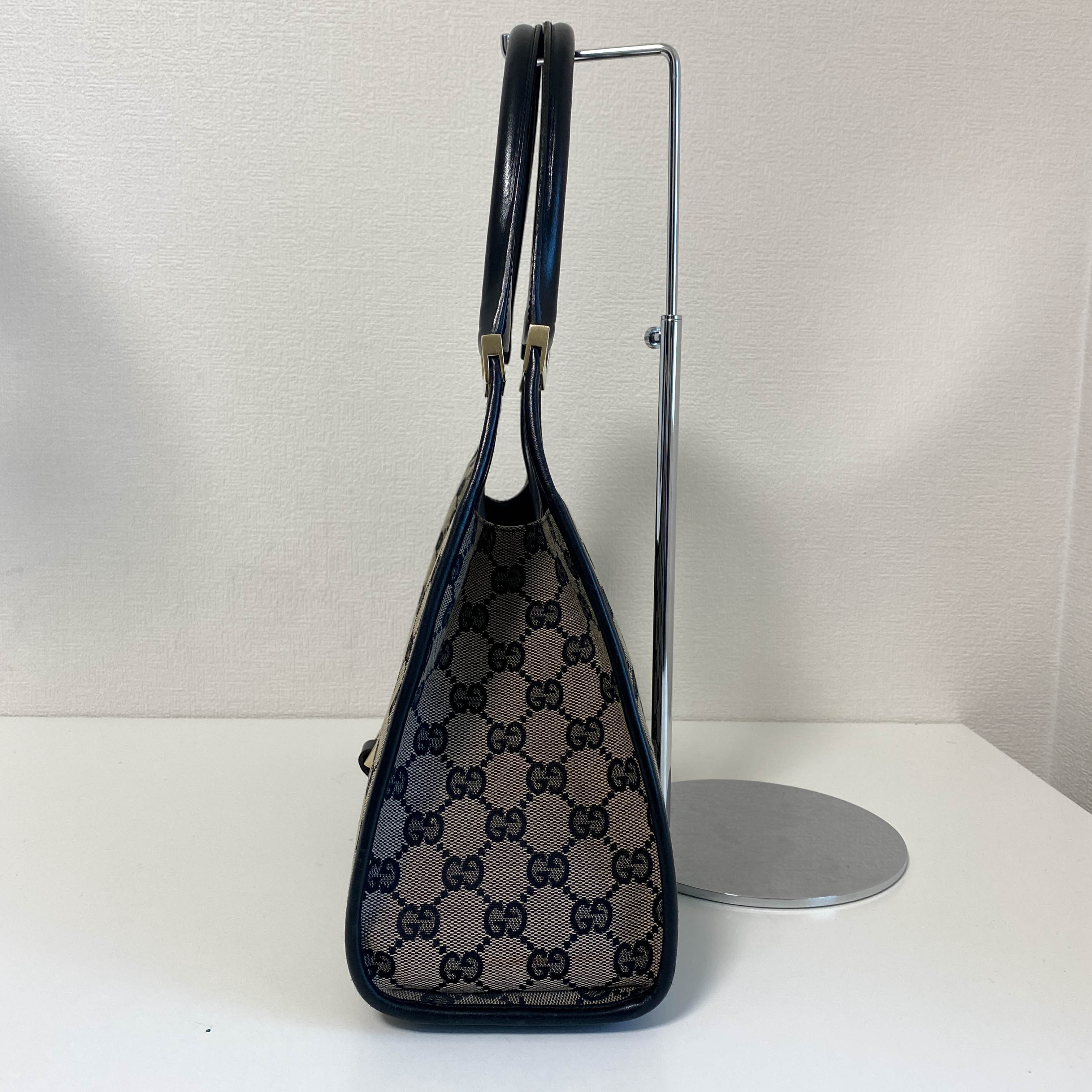 Jackie Black Leather and Canvas Shoulder bag with Gold Hardware