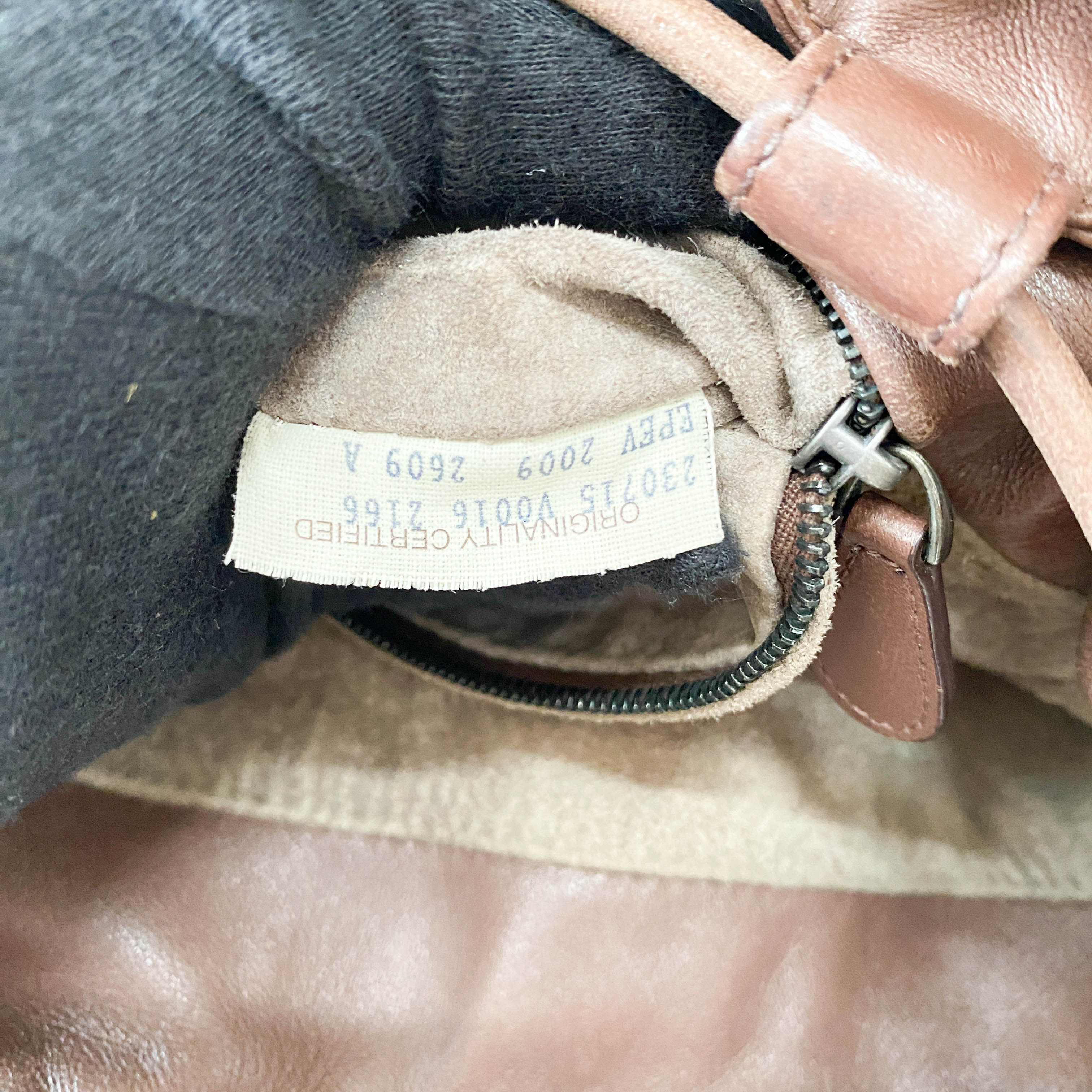 Intrecciato Brown Leather Drawstring bag