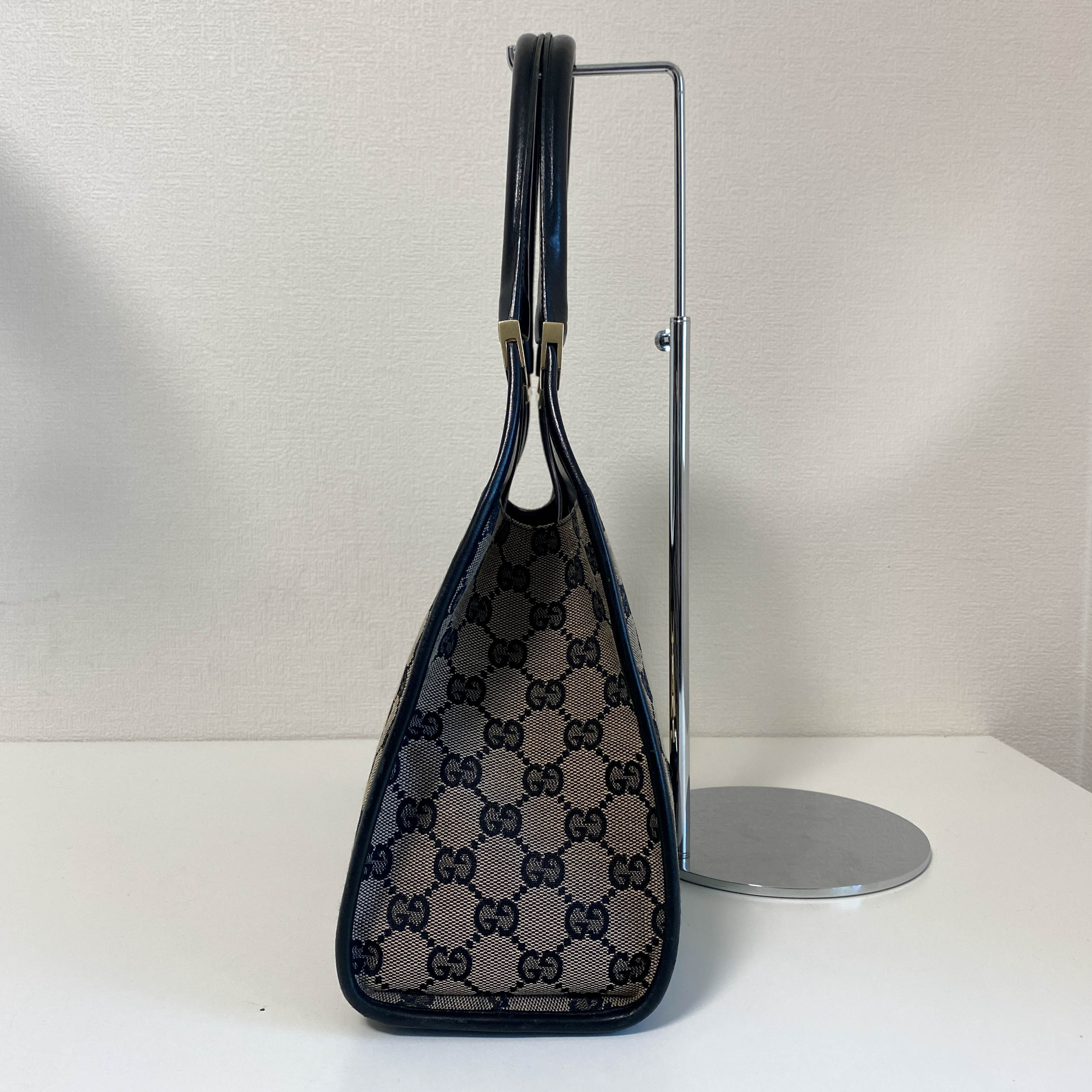 Jackie Black Leather and Canvas Shoulder bag with Gold Hardware