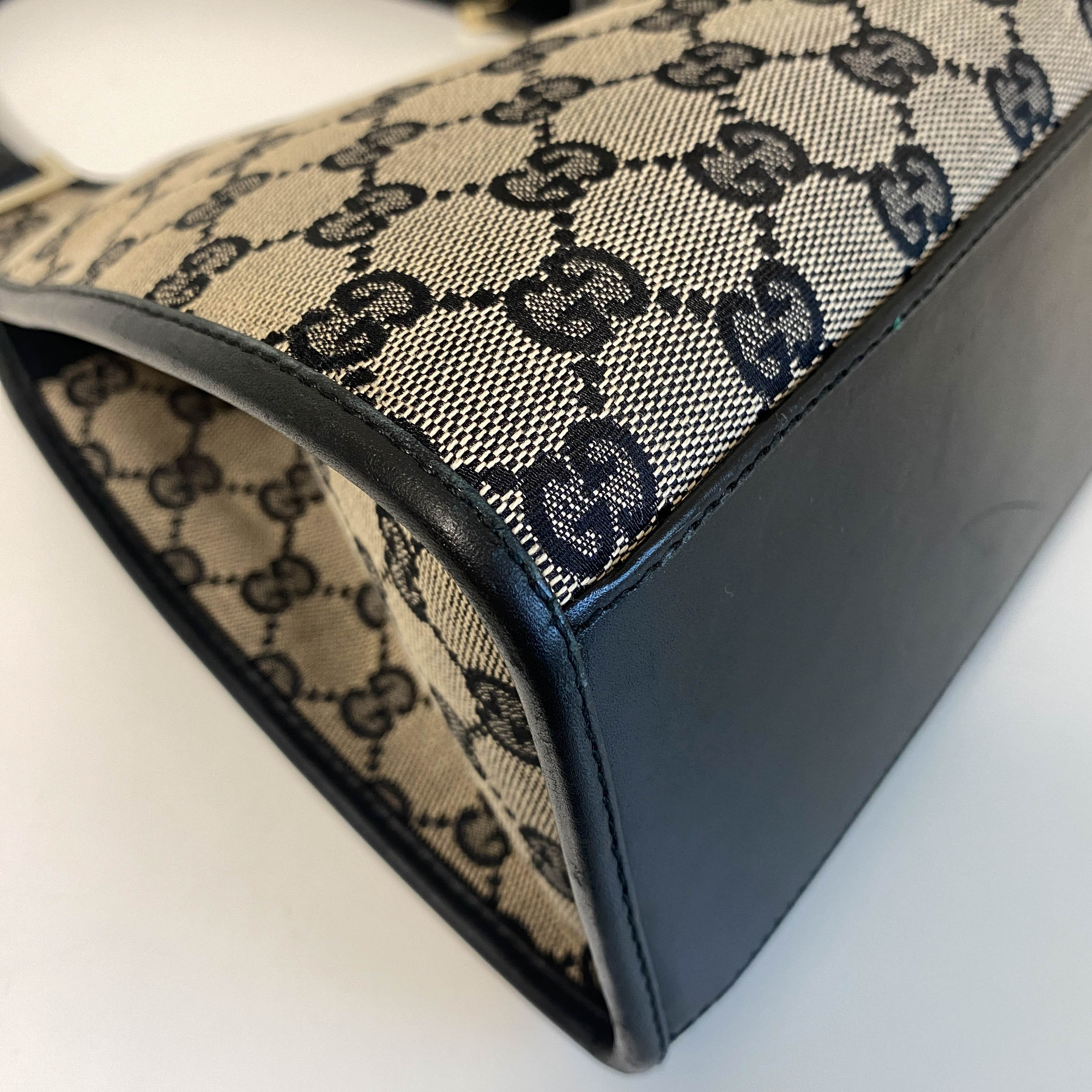 Jackie Black Leather and Canvas Shoulder bag with Gold Hardware