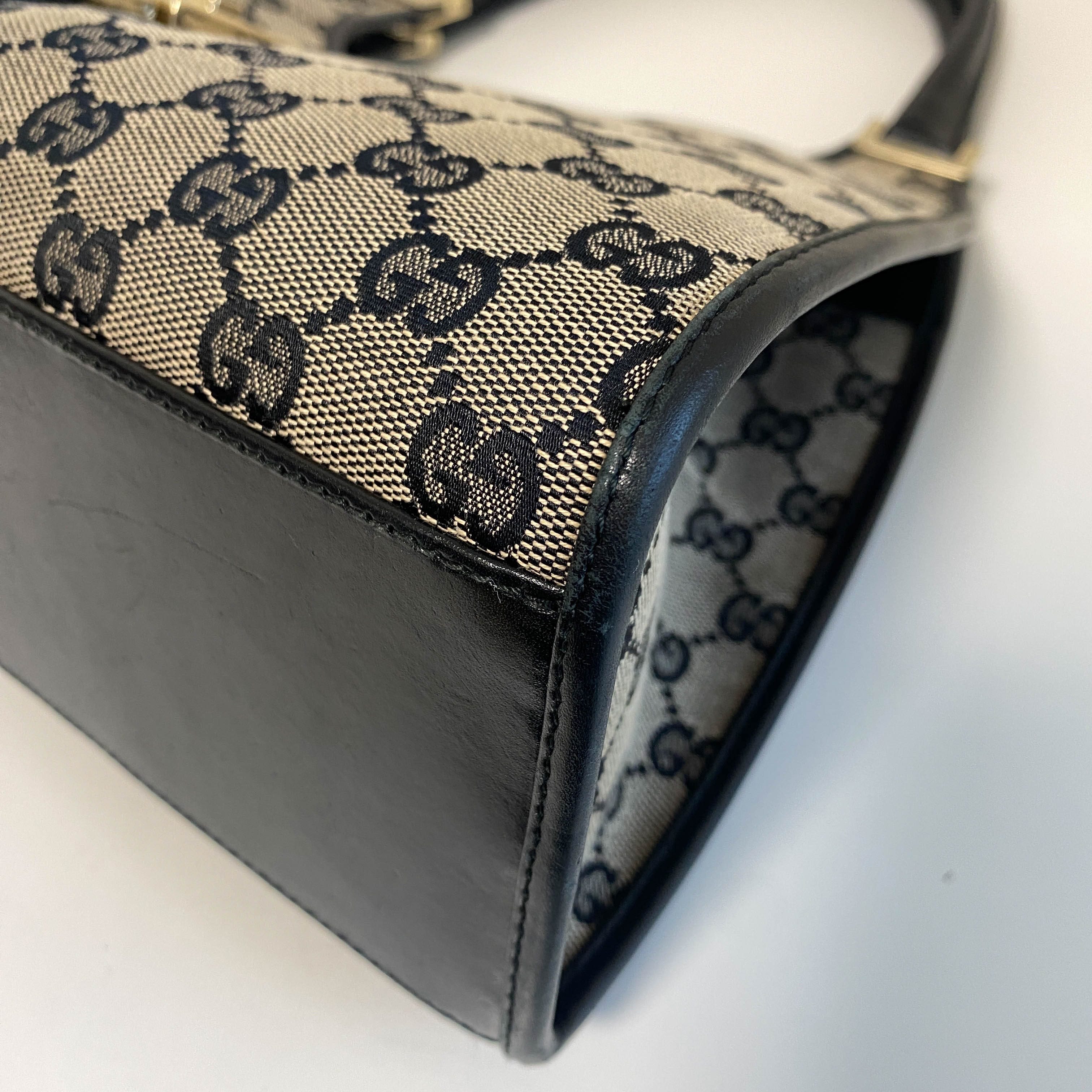 Jackie Black Leather and Canvas Shoulder bag with Gold Hardware