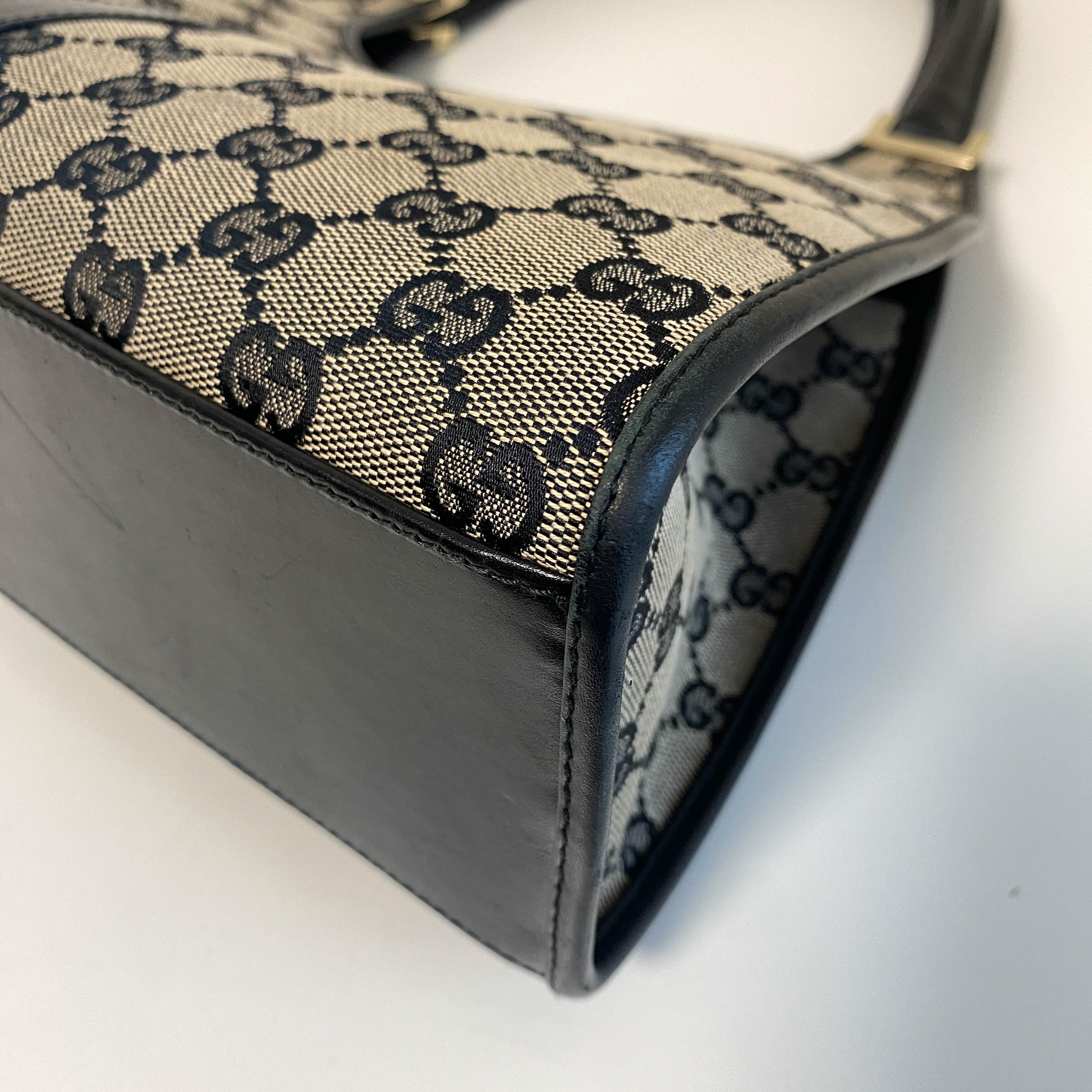 Jackie Black Leather and Canvas Shoulder bag with Gold Hardware