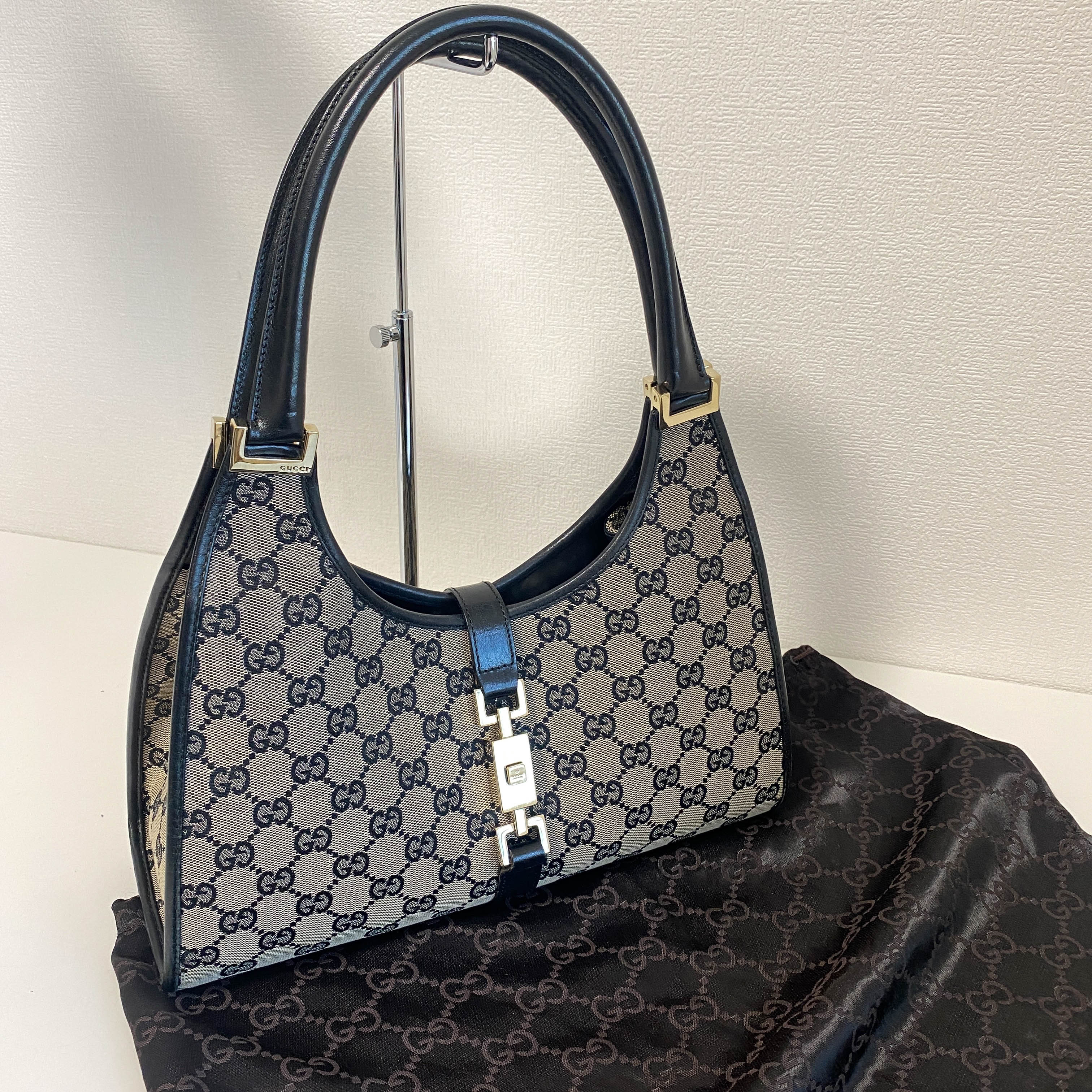 Jackie Black Leather and Canvas Shoulder bag with Gold Hardware