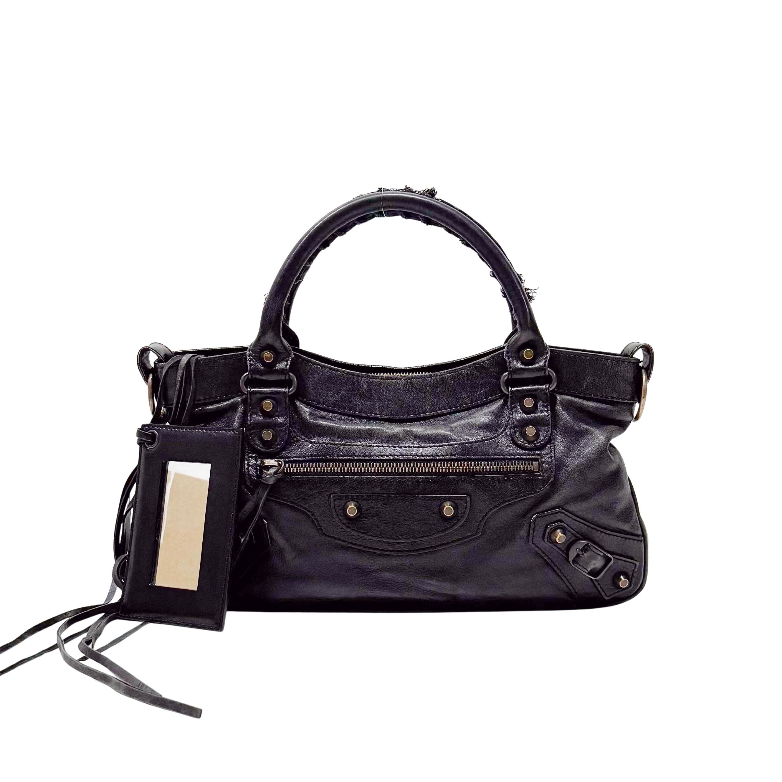 The First Black Calfskin Leather Handlebag