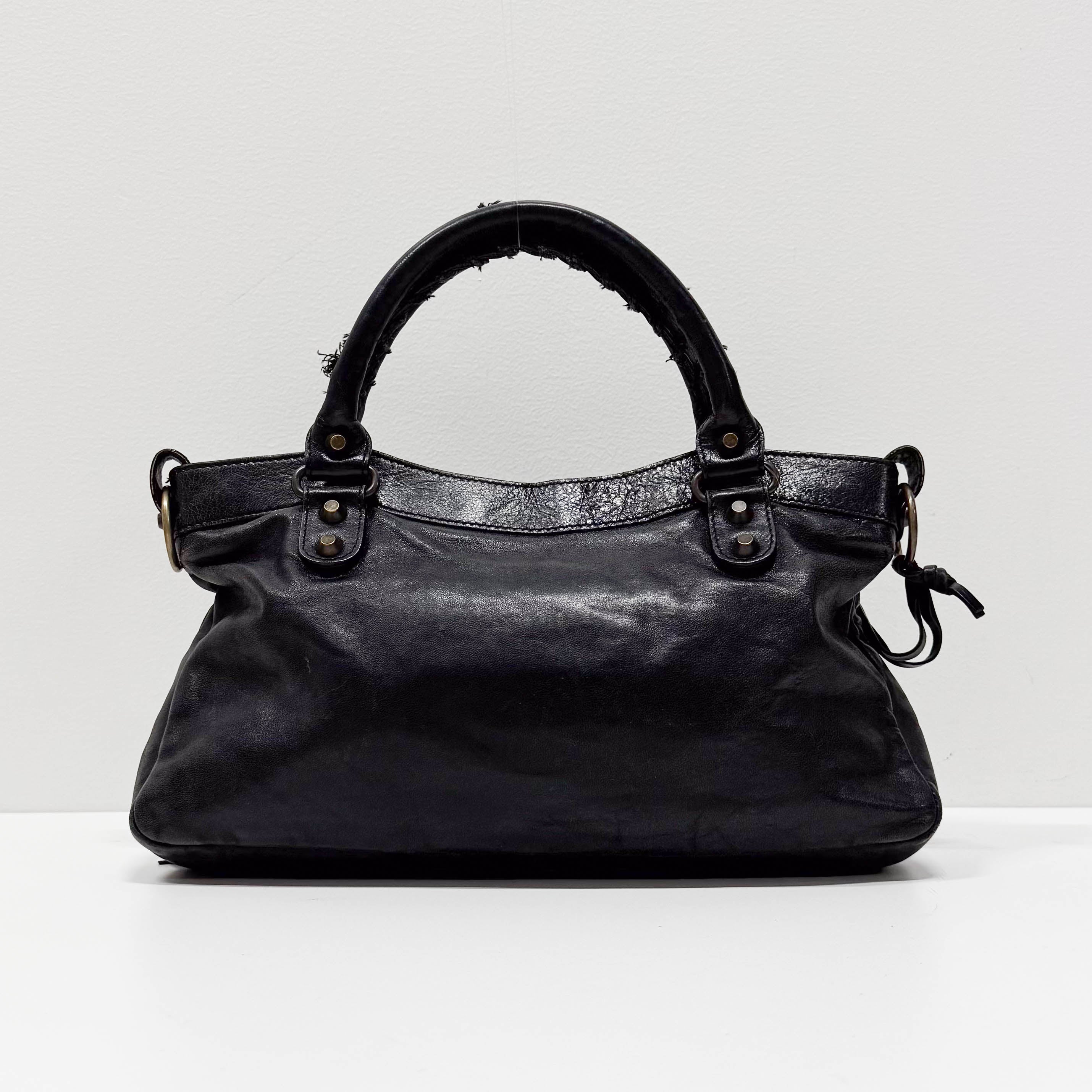 The First Black Calfskin Leather Handlebag