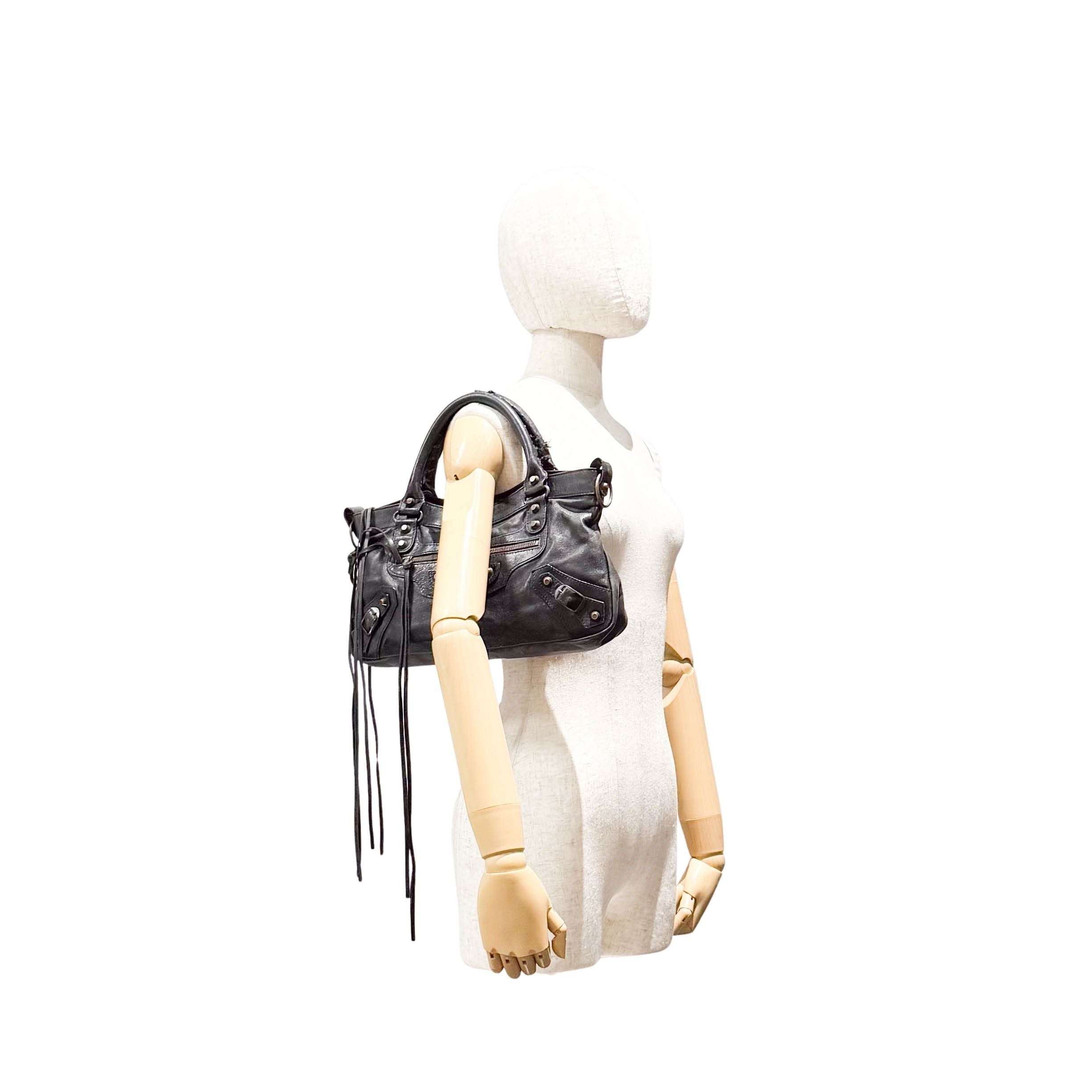 The First Black Calfskin Leather Handlebag