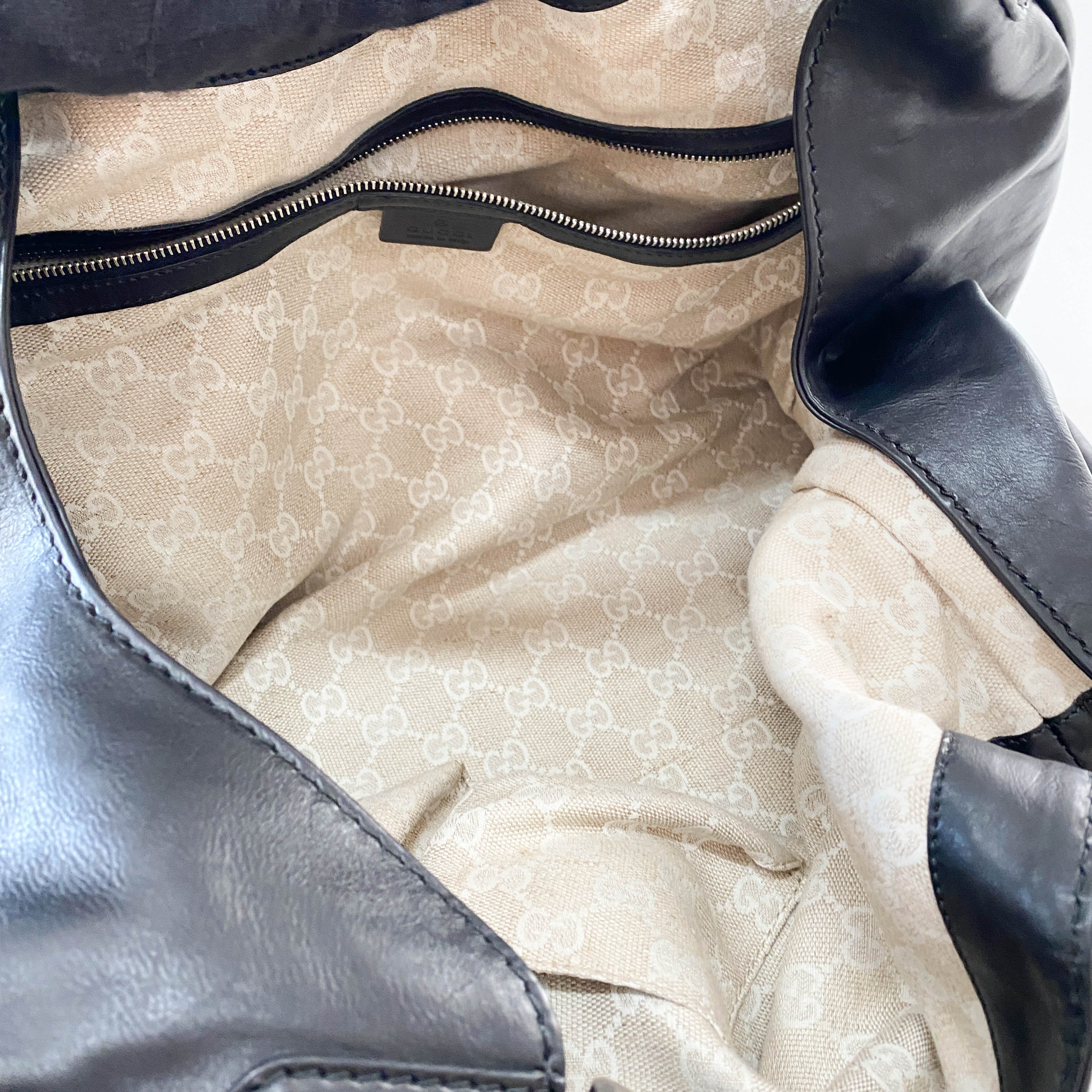 Large Stirrup Black Leather Top Handle  