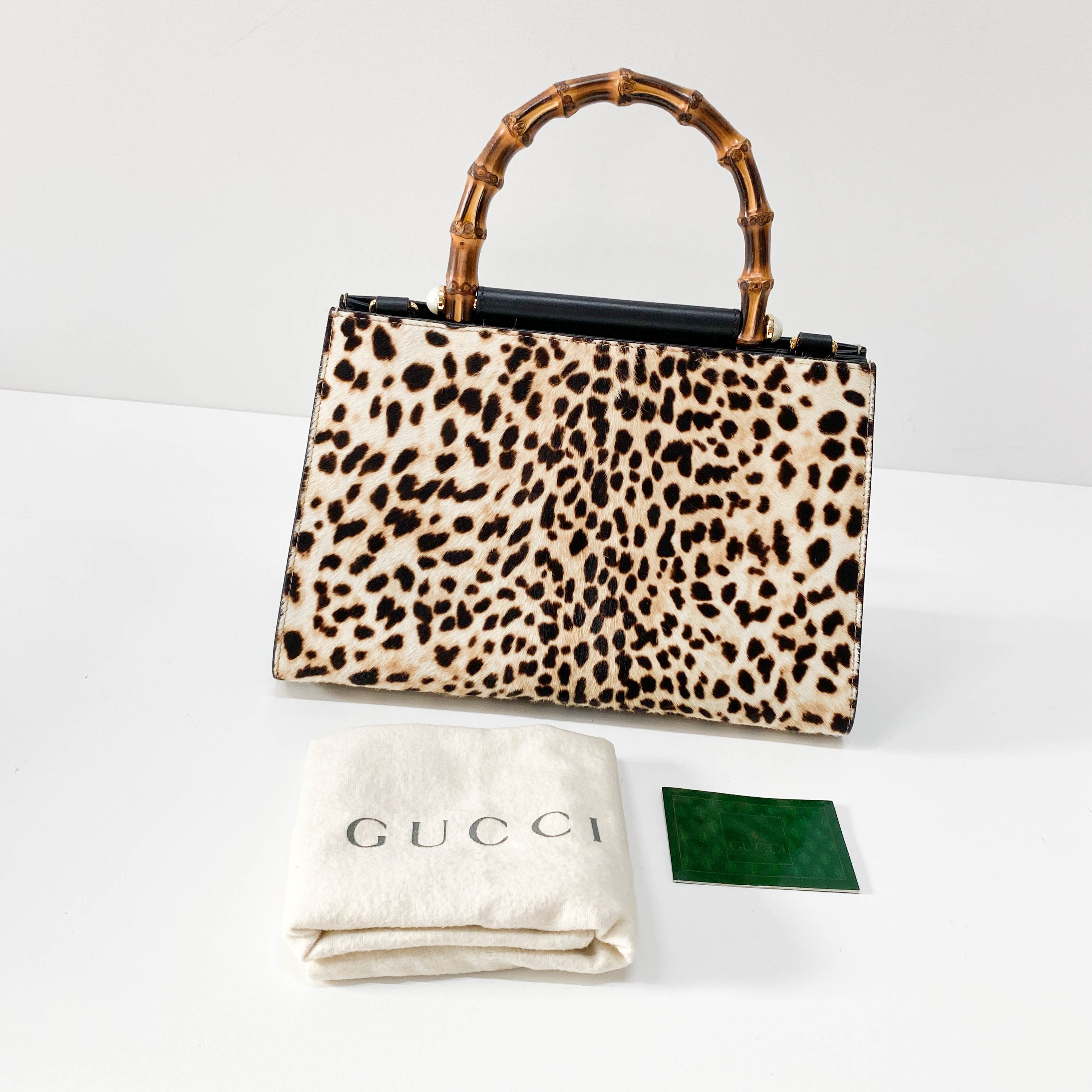 Nymphaea Leopard Calf Hair Bamboo Handle Bag