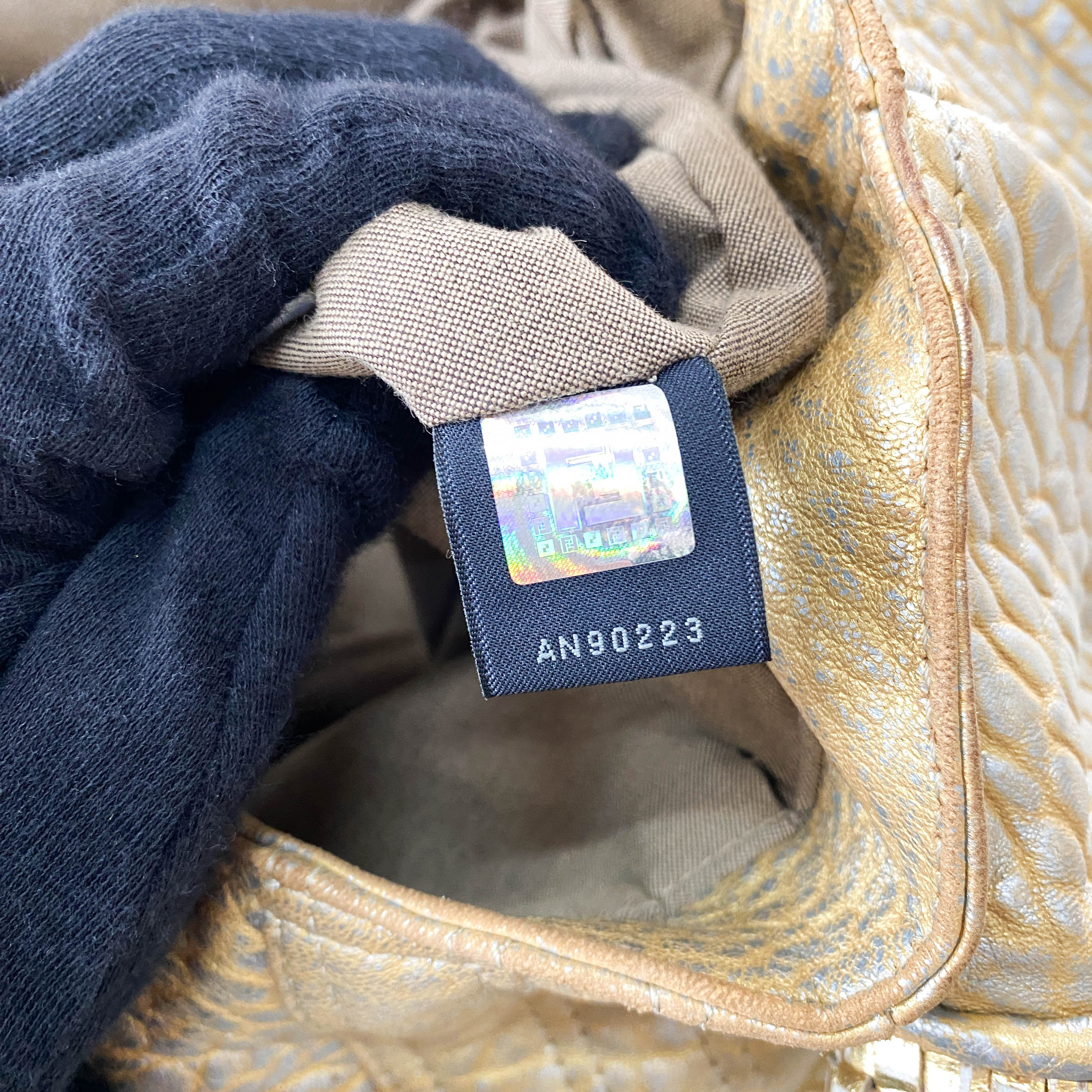 Spy Gold Leather Shoulder Bag