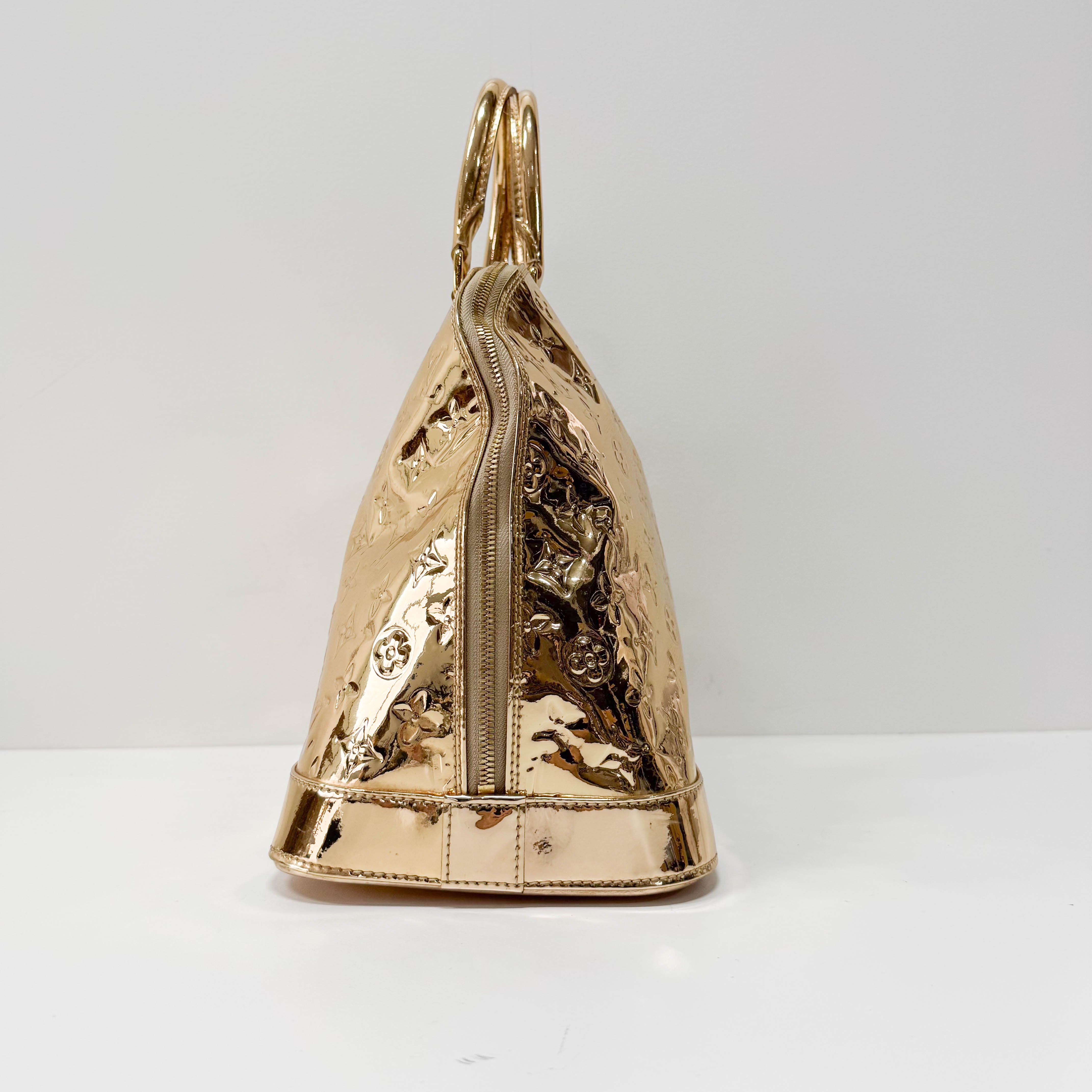 Mirroir Alma GM Monogram Gold Canvas Handbag