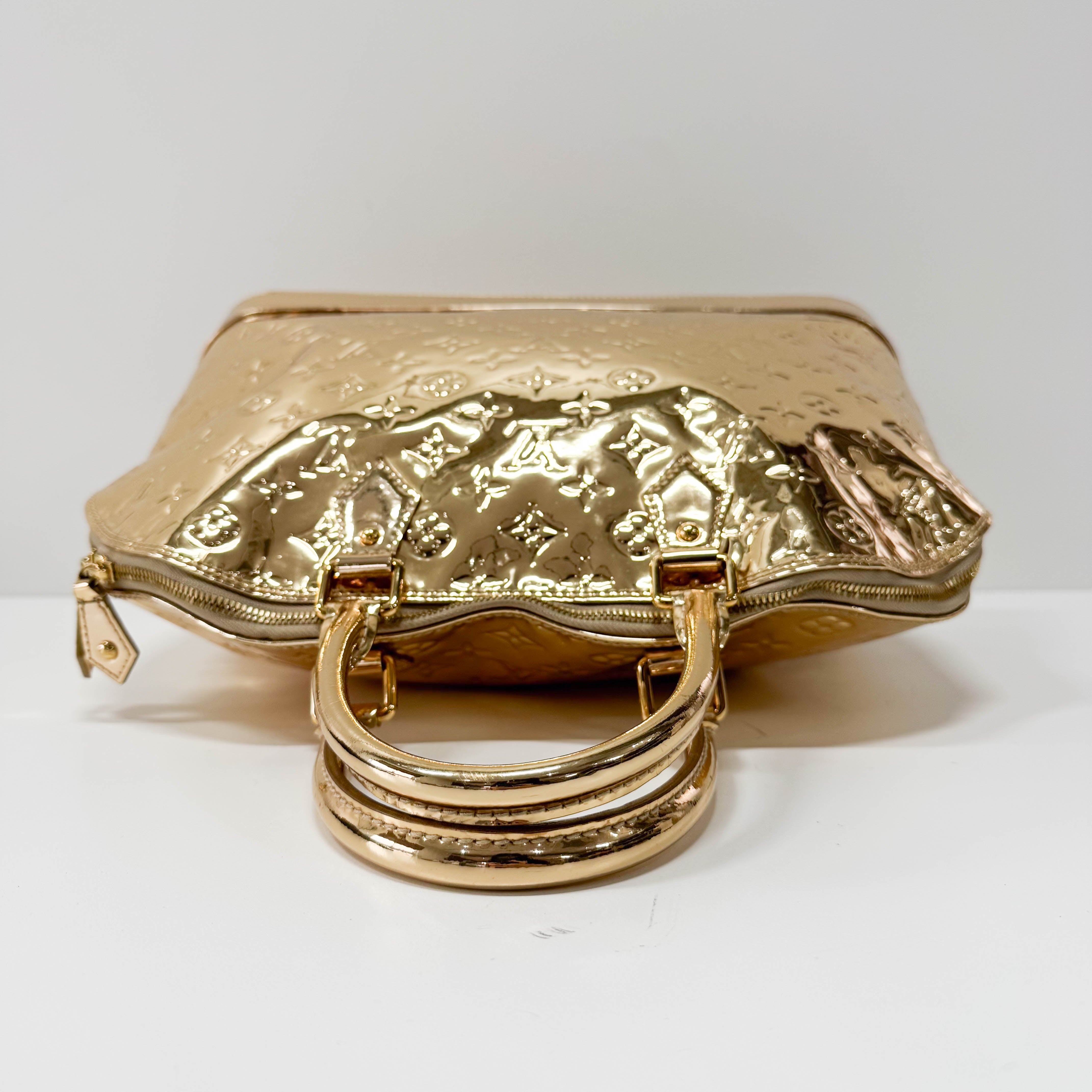 Mirroir Alma GM Monogram Gold Canvas Handbag