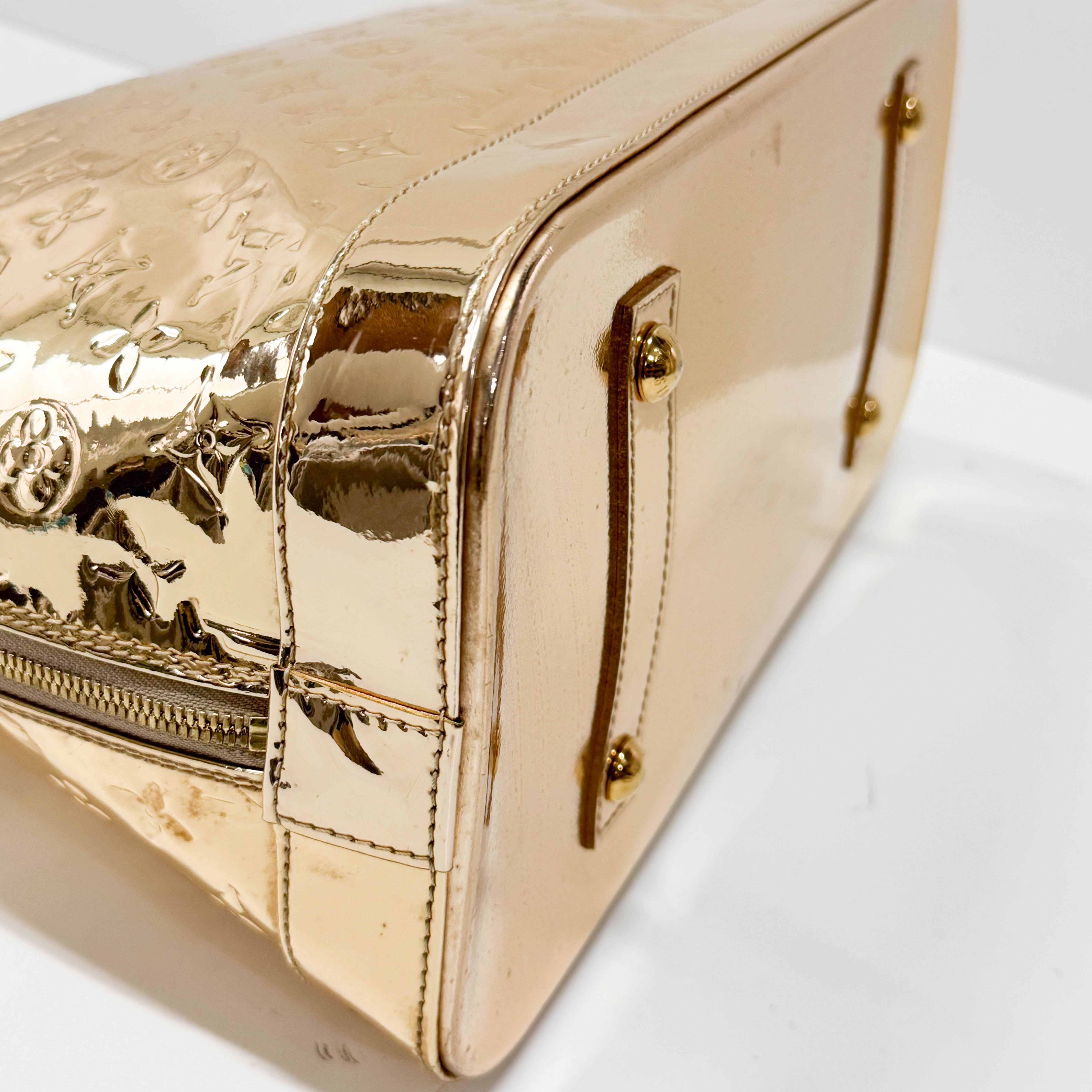 Mirroir Alma GM Monogram Gold Canvas Handbag