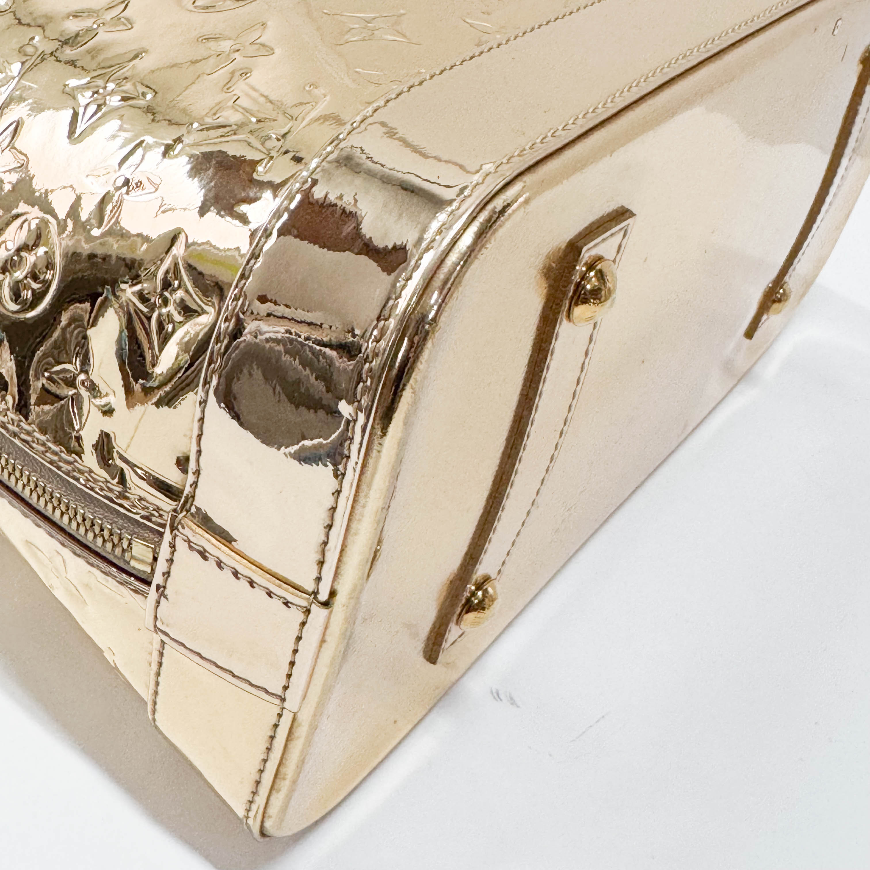 Mirroir Alma GM Monogram Gold Canvas Handbag