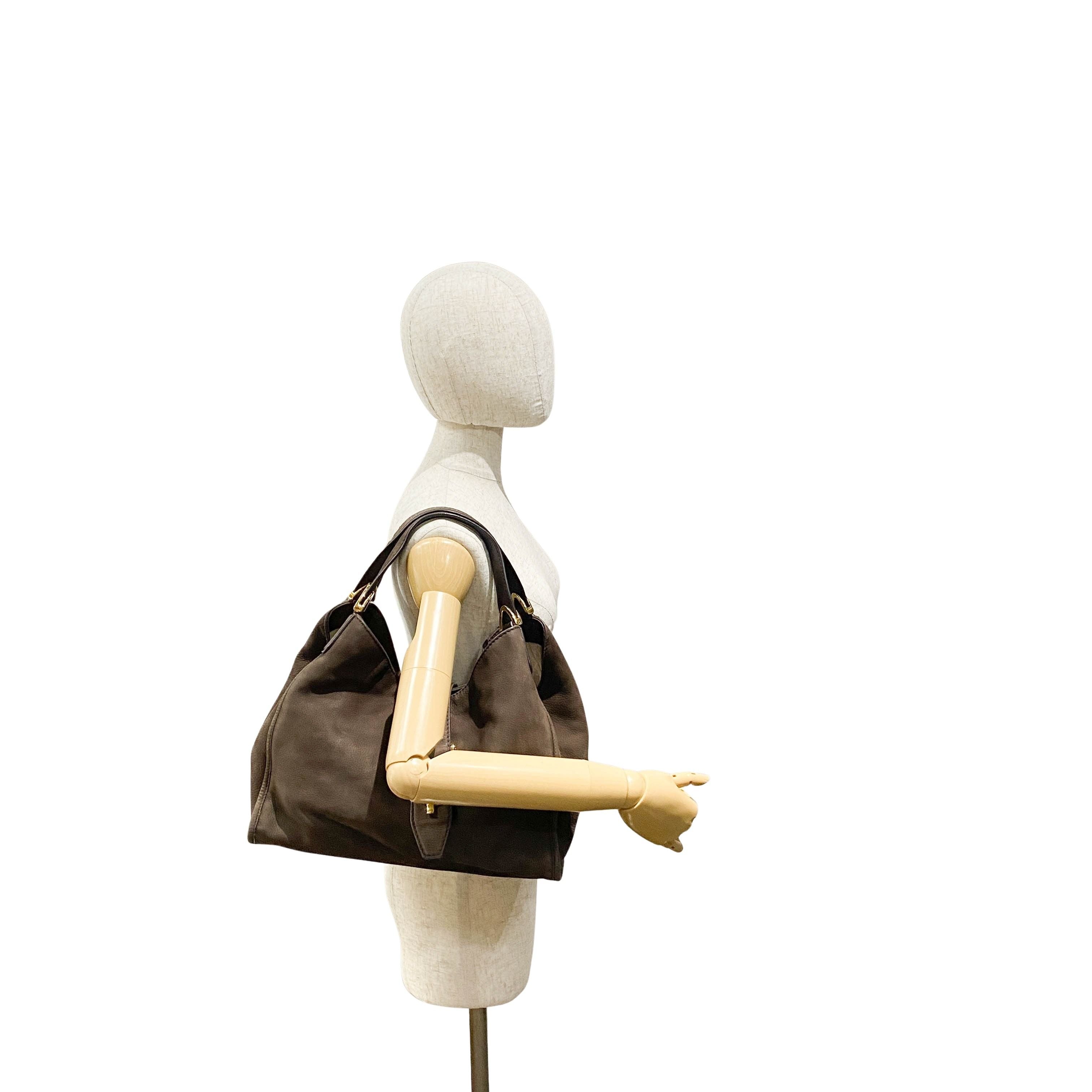 Stirrup Brown Leather Hand Bag