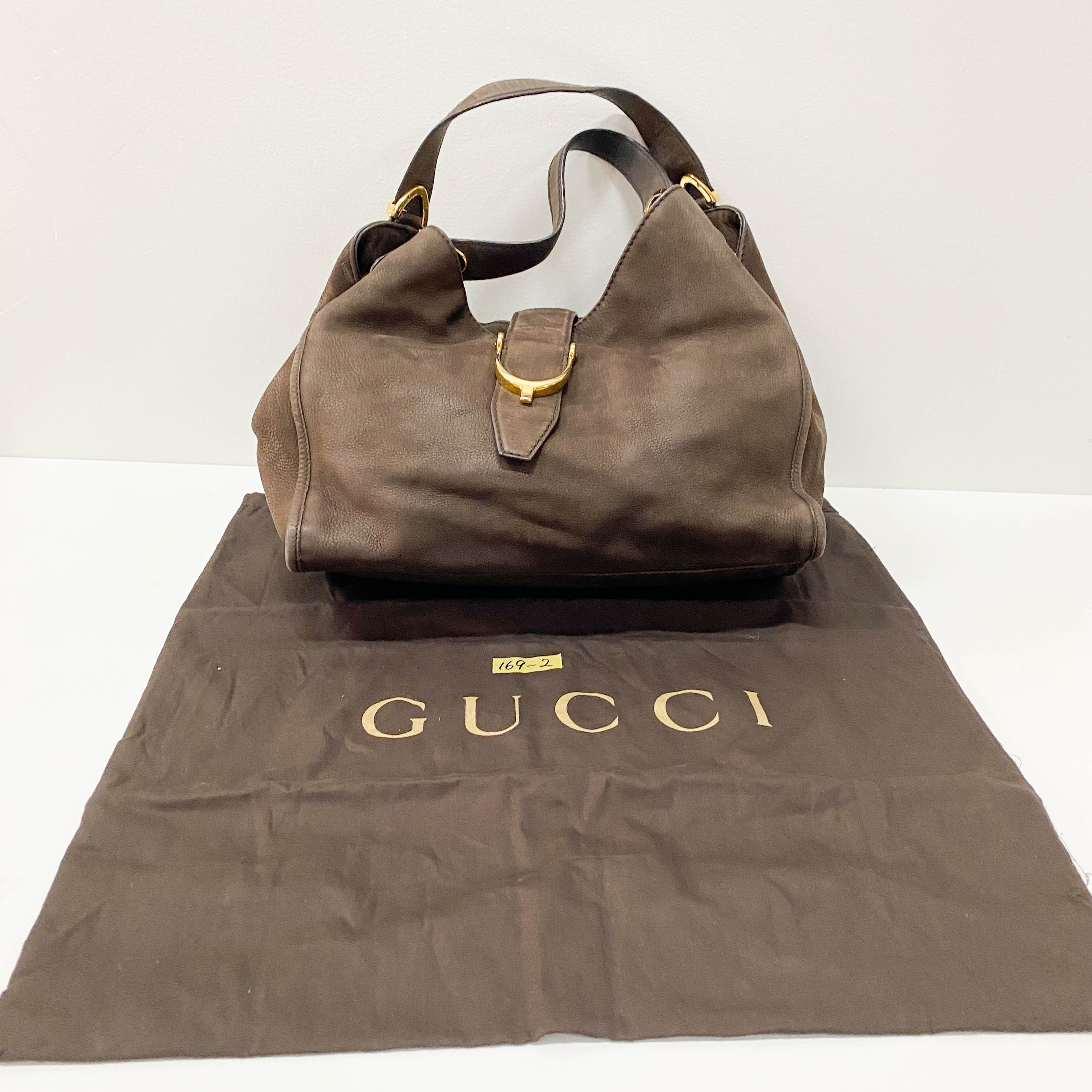 Stirrup Brown Leather Hand Bag