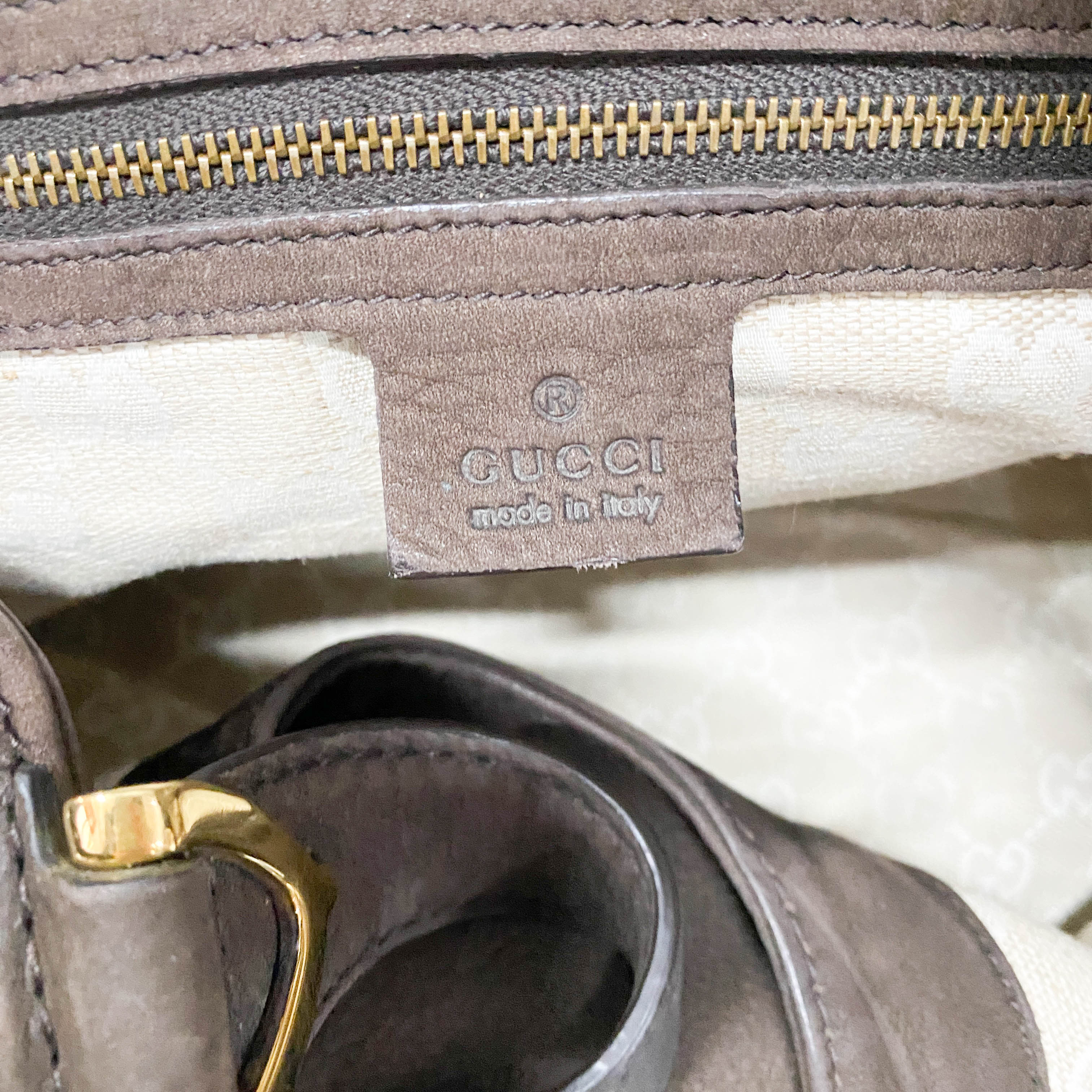 Stirrup Brown Leather Hand Bag