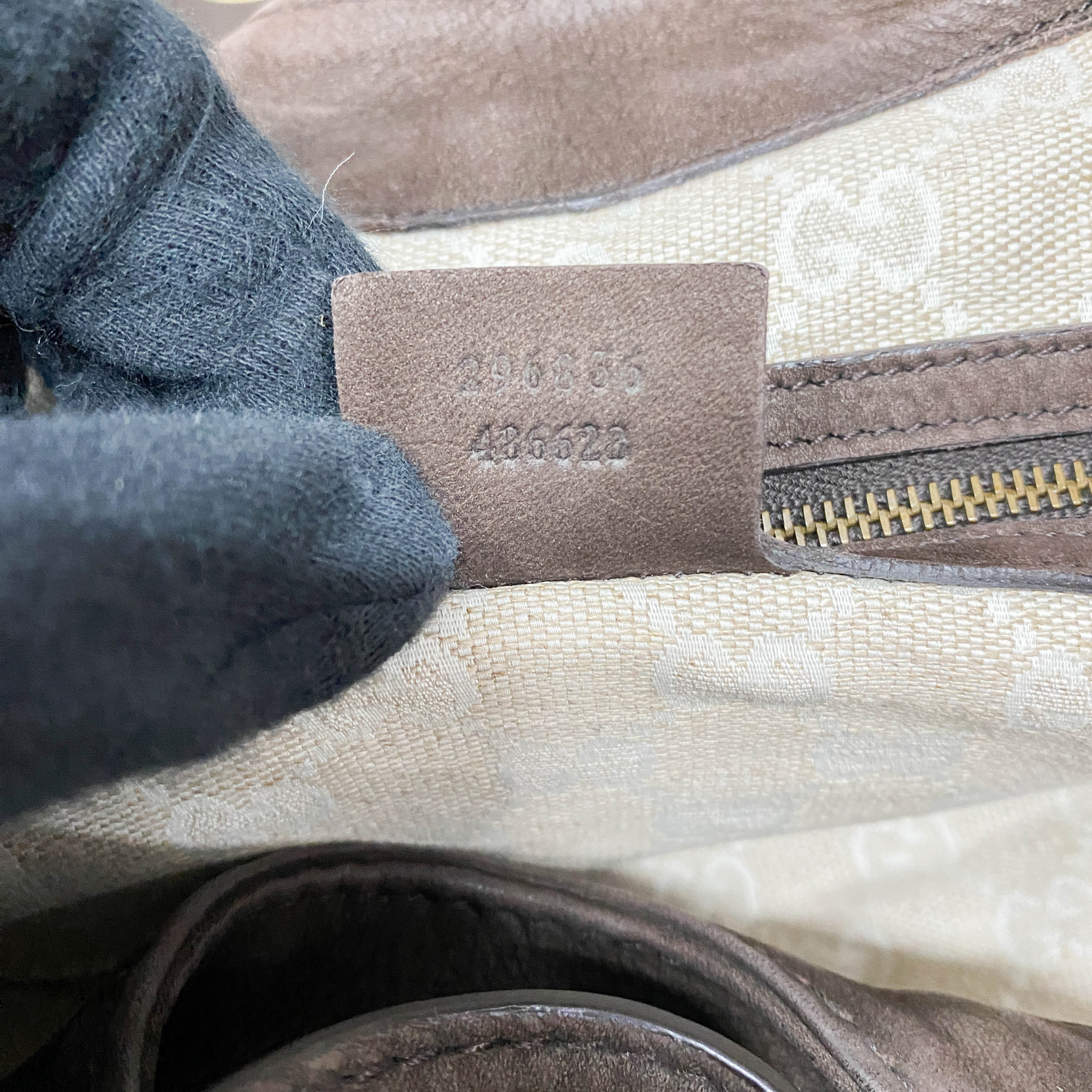 Stirrup Brown Leather Hand Bag