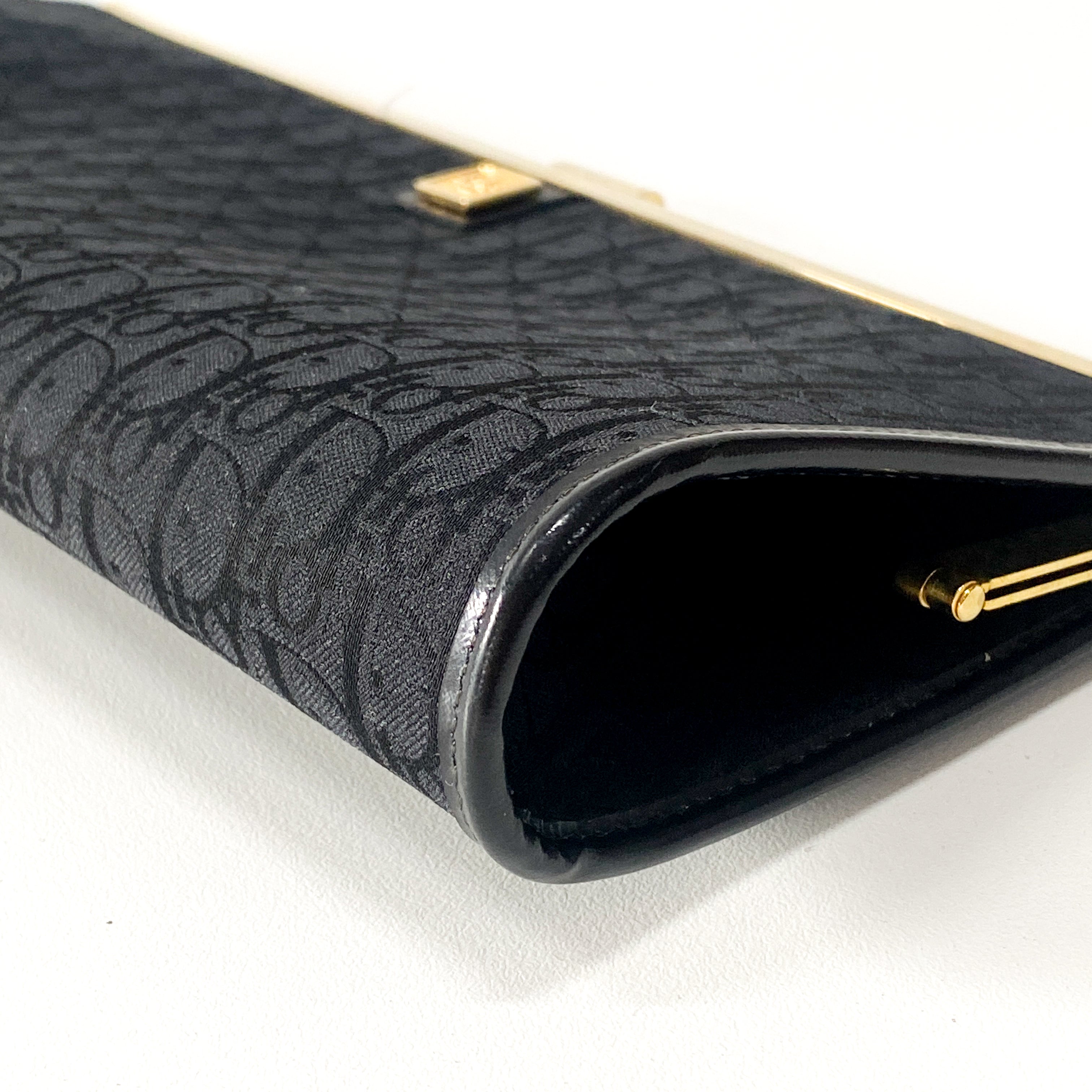 Trotter Black Canvas Clutch Bag