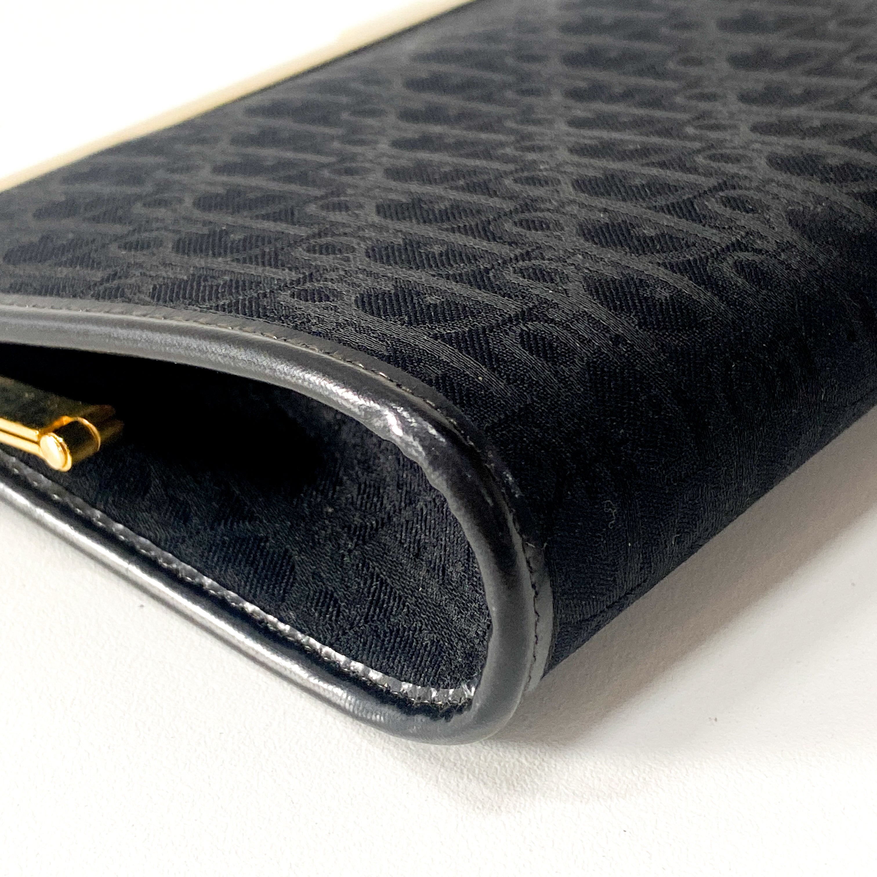 Trotter Black Canvas Clutch Bag