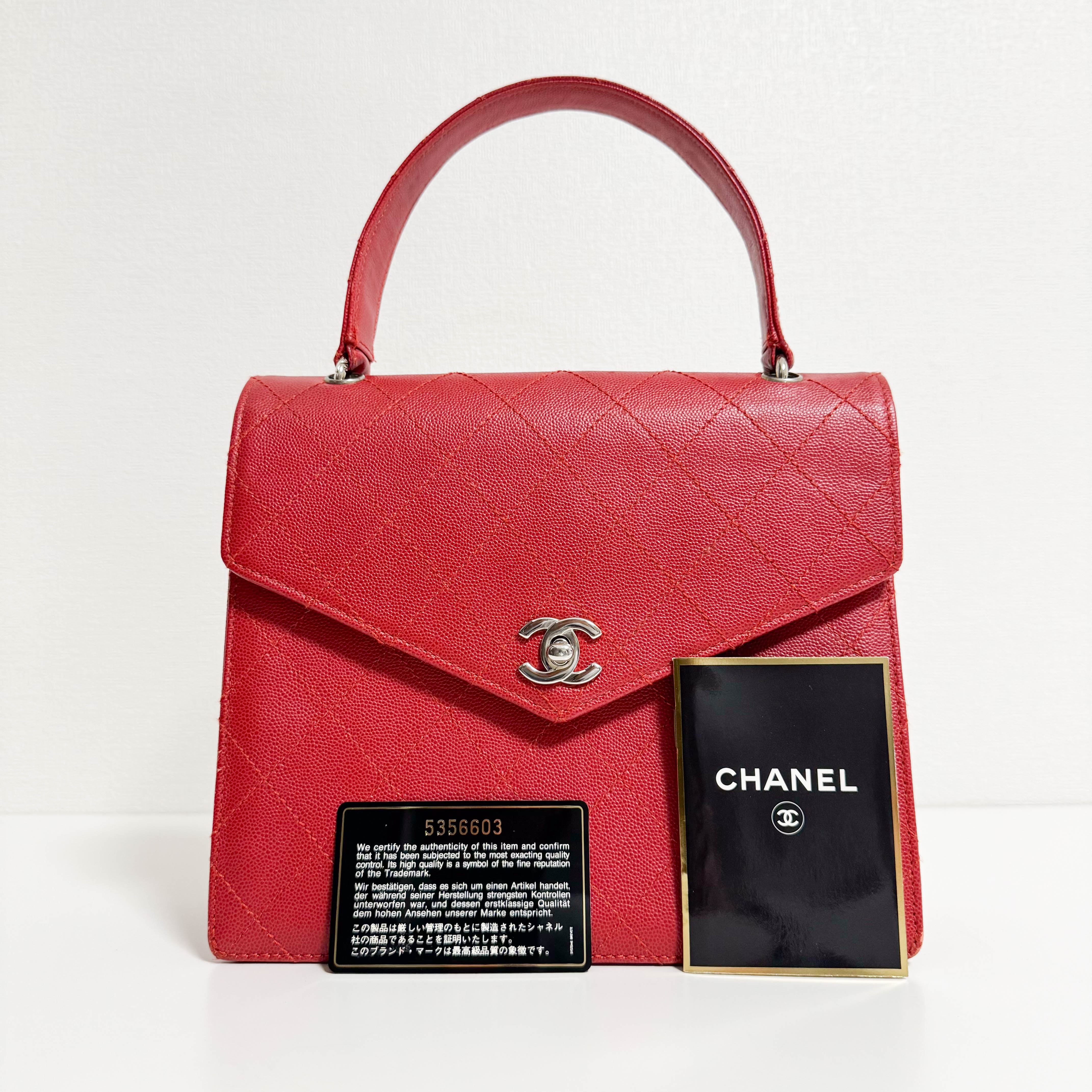 CHANEL Red Quilted Caviar Leather Envelope Flap Square Top Handle Handbag, in , Sold by HIVE PRELOVED - Handle Bags