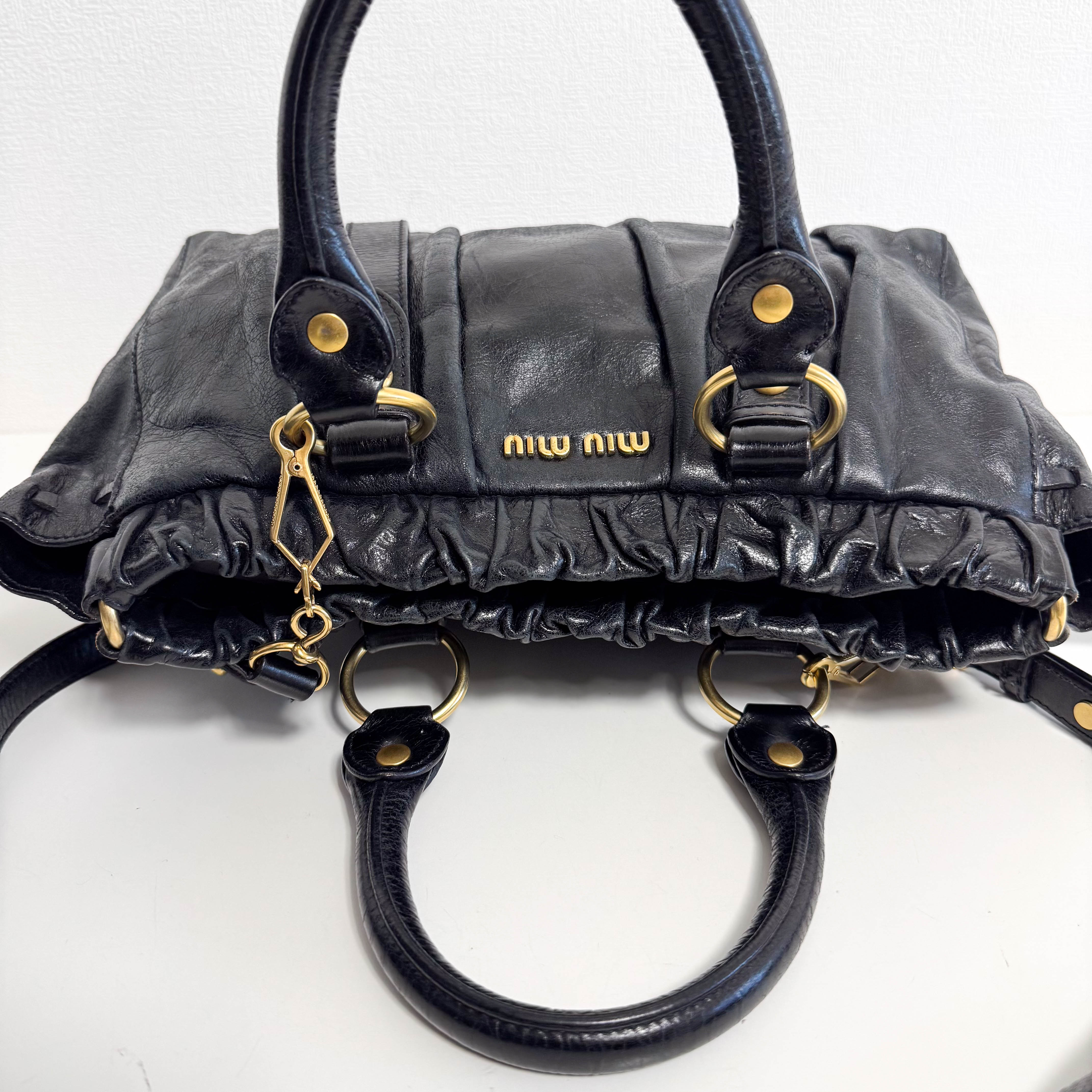 Vitello Black Leather Top Handle Bag