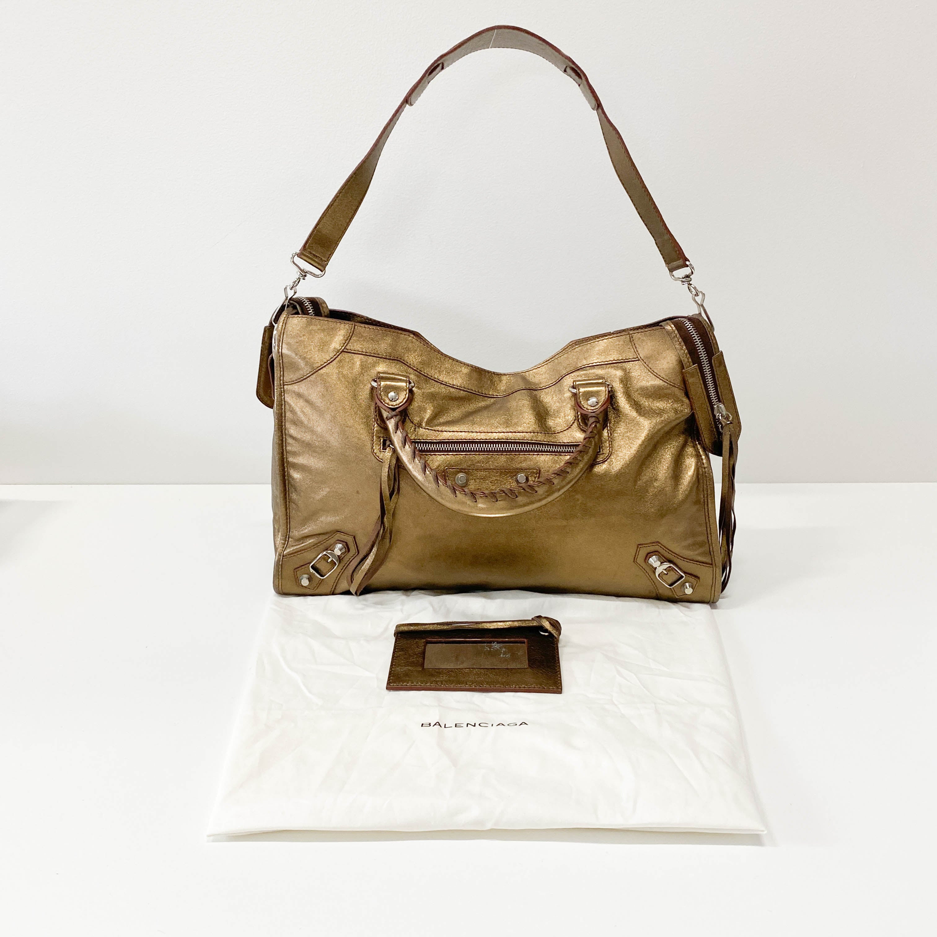 The City Gold Leather Hand bag