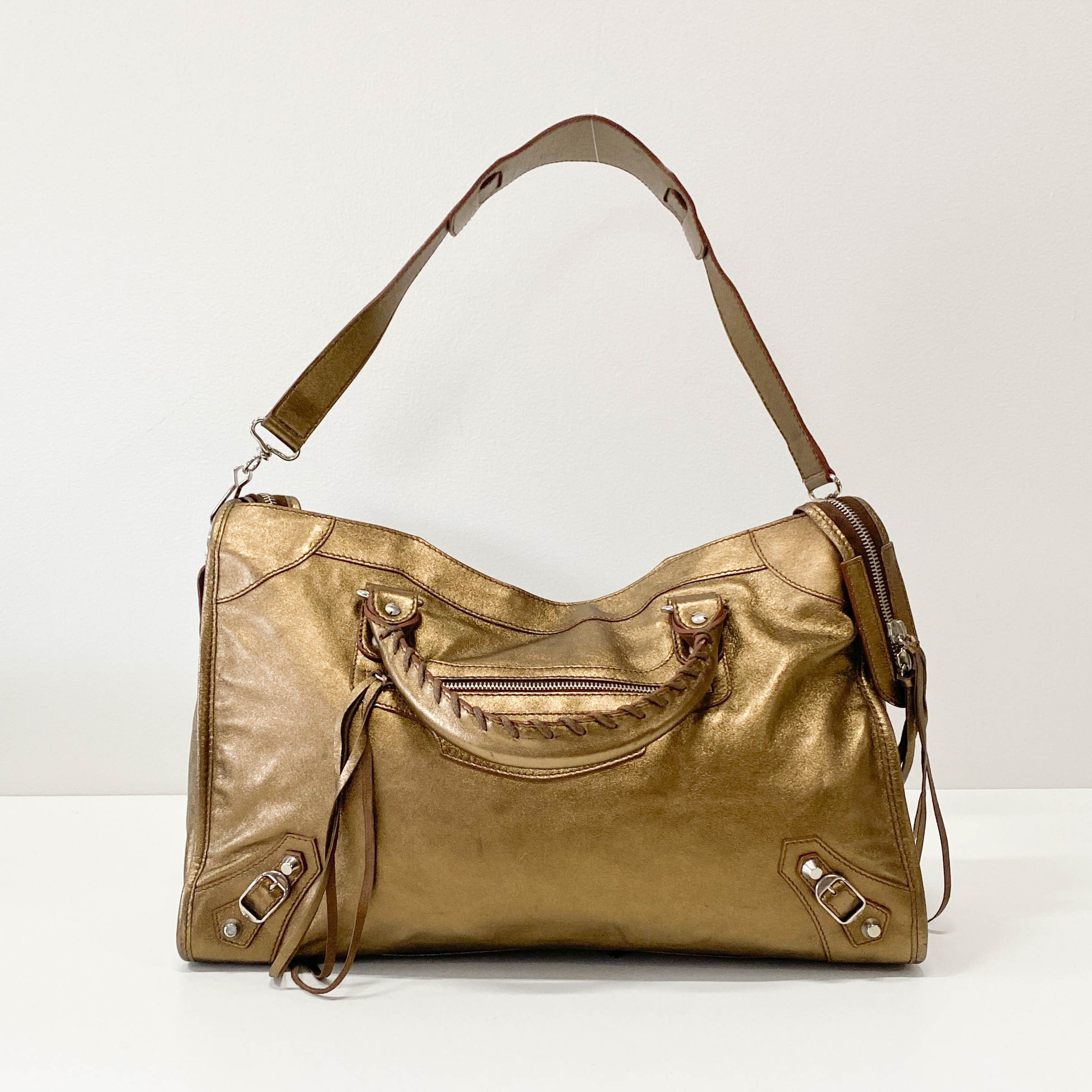 The City Gold Leather Hand bag