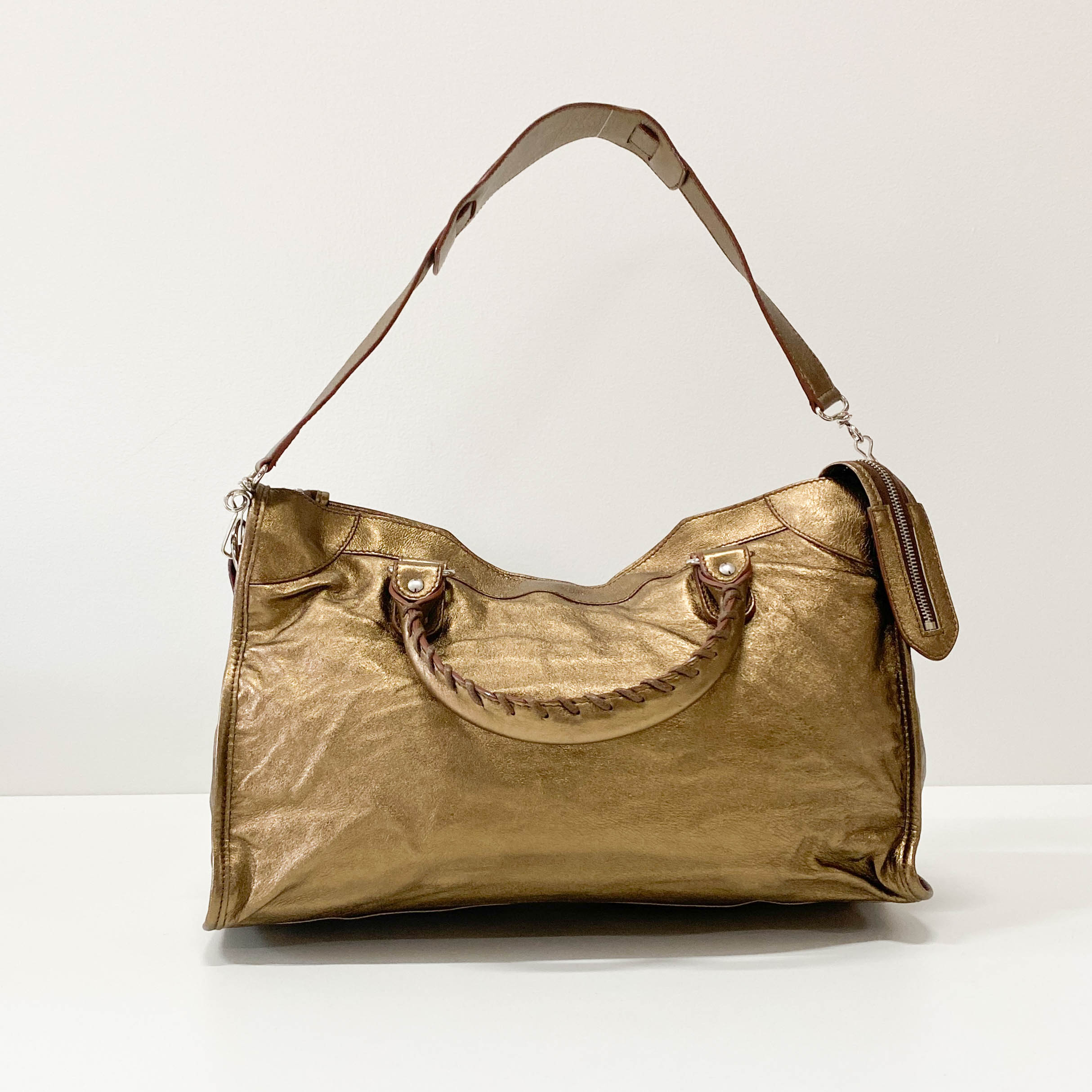The City Gold Leather Hand bag