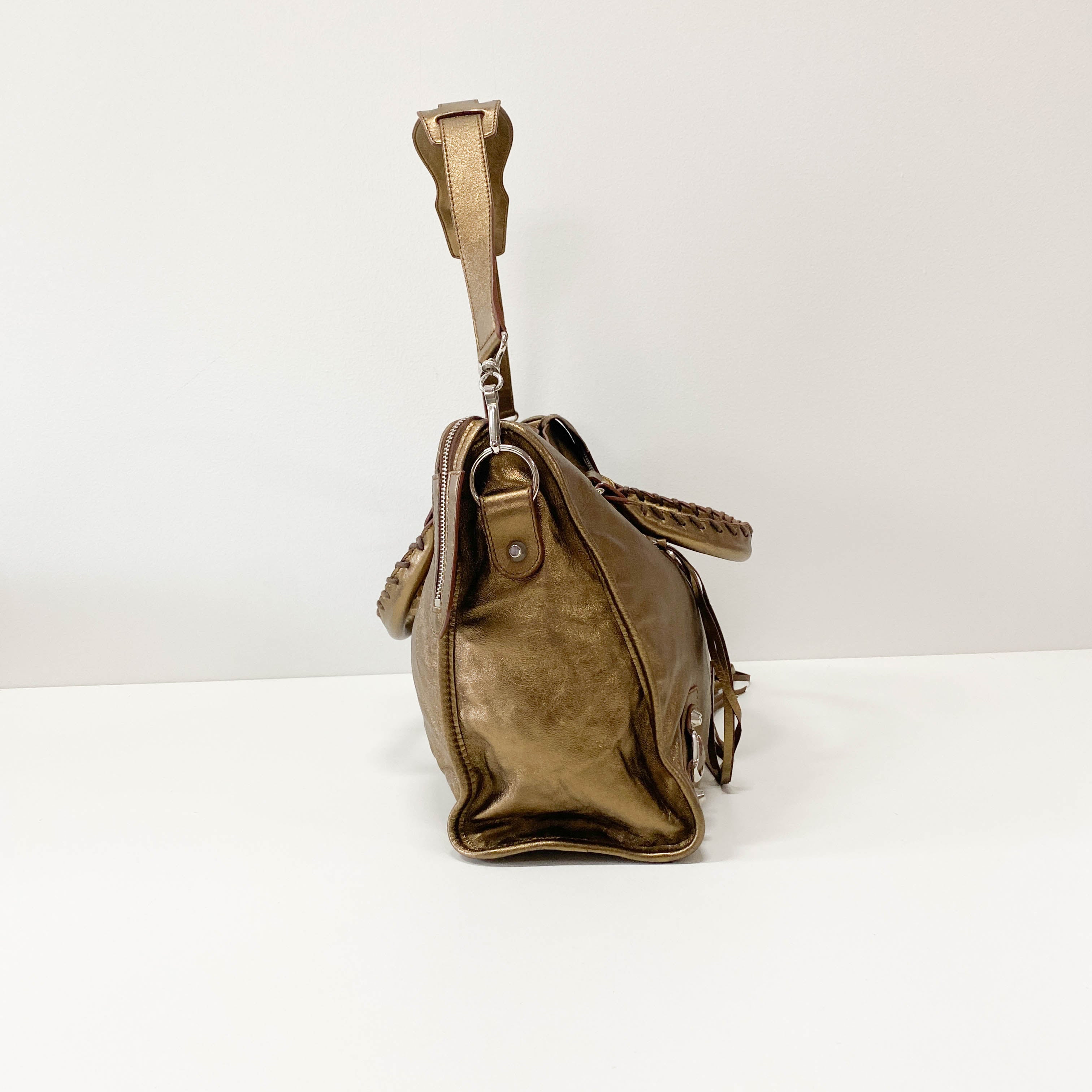 The City Gold Leather Hand bag