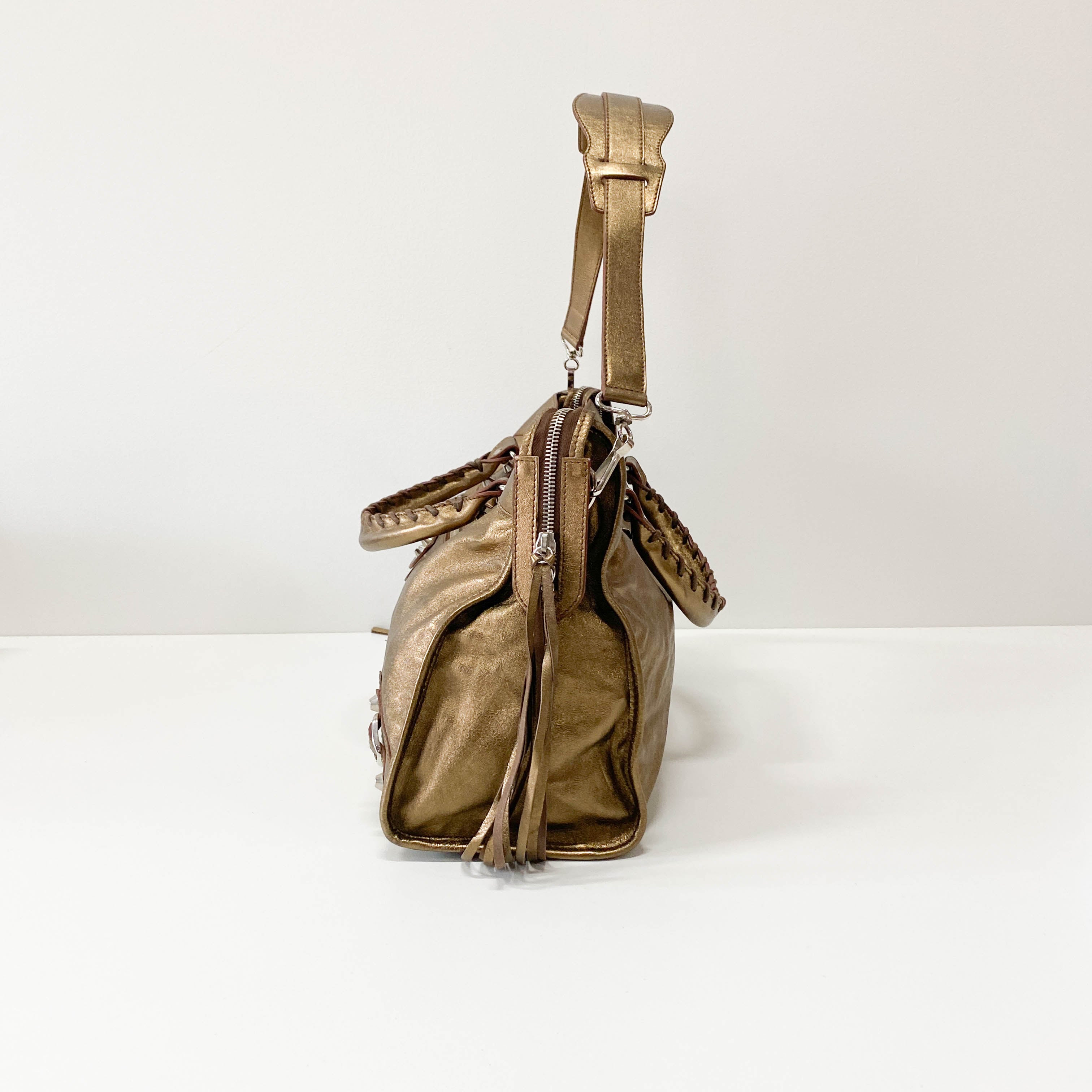 The City Gold Leather Hand bag