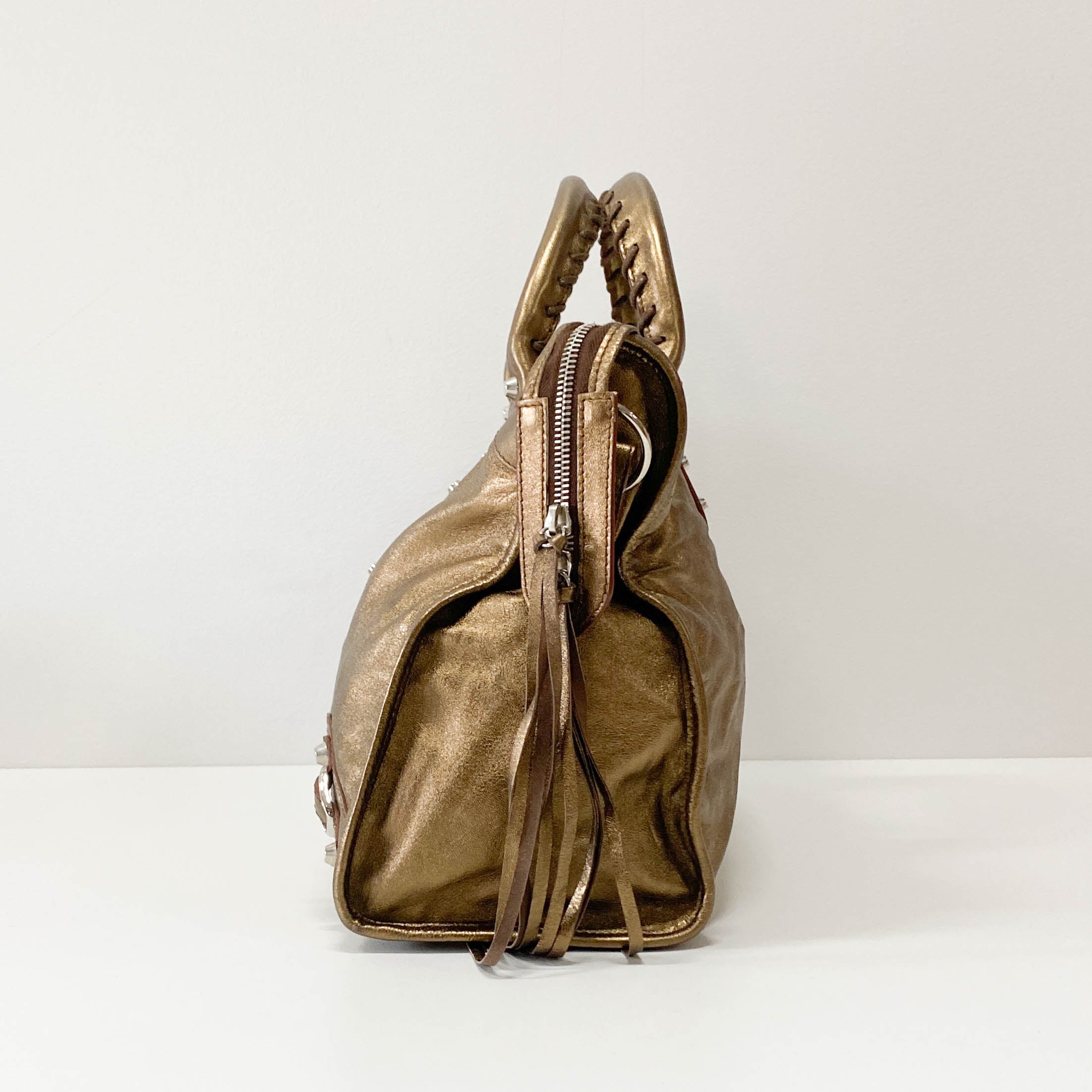 The City Gold Leather Hand bag
