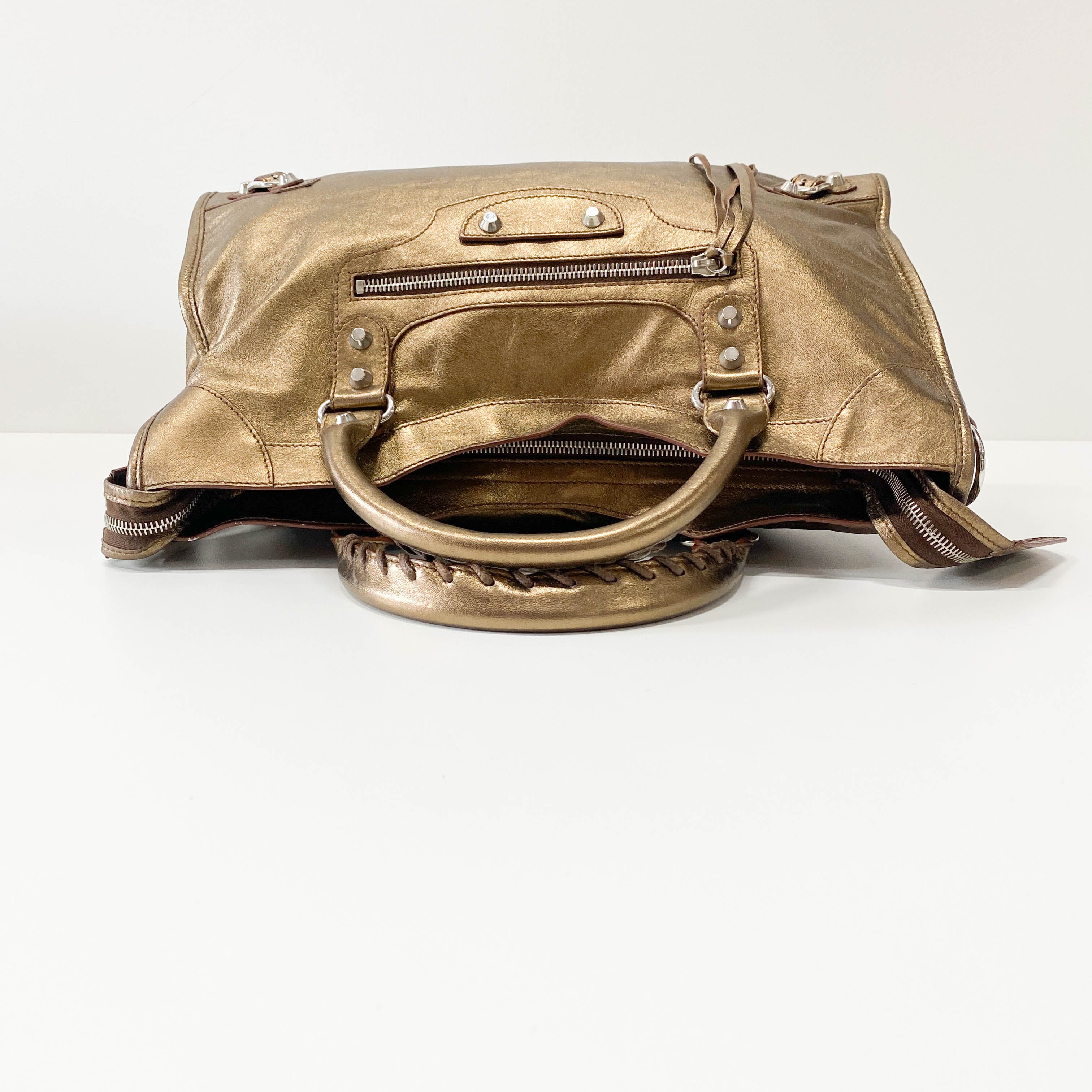 The City Gold Leather Hand bag