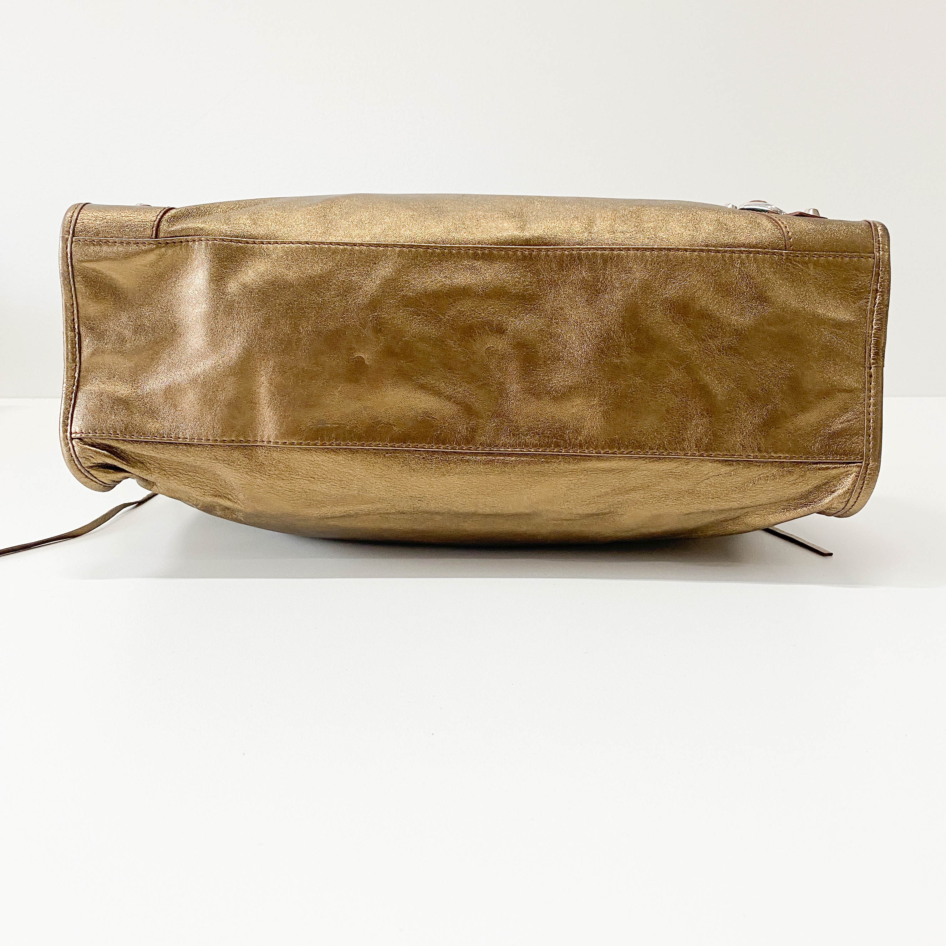 The City Gold Leather Hand bag