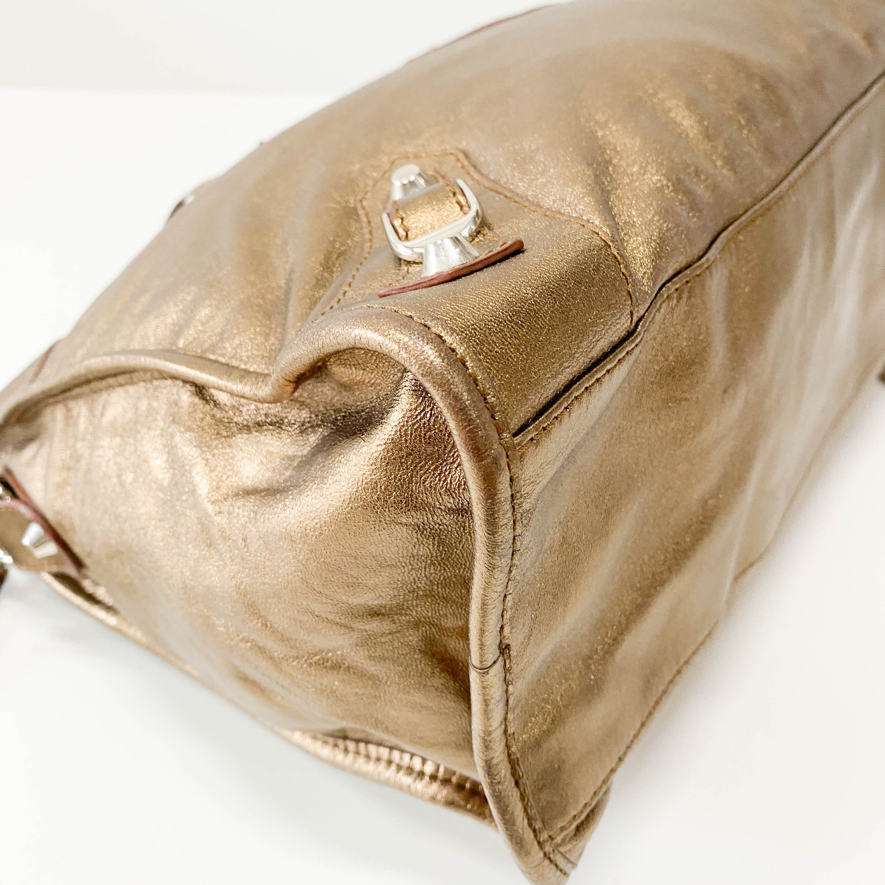 The City Gold Leather Hand bag