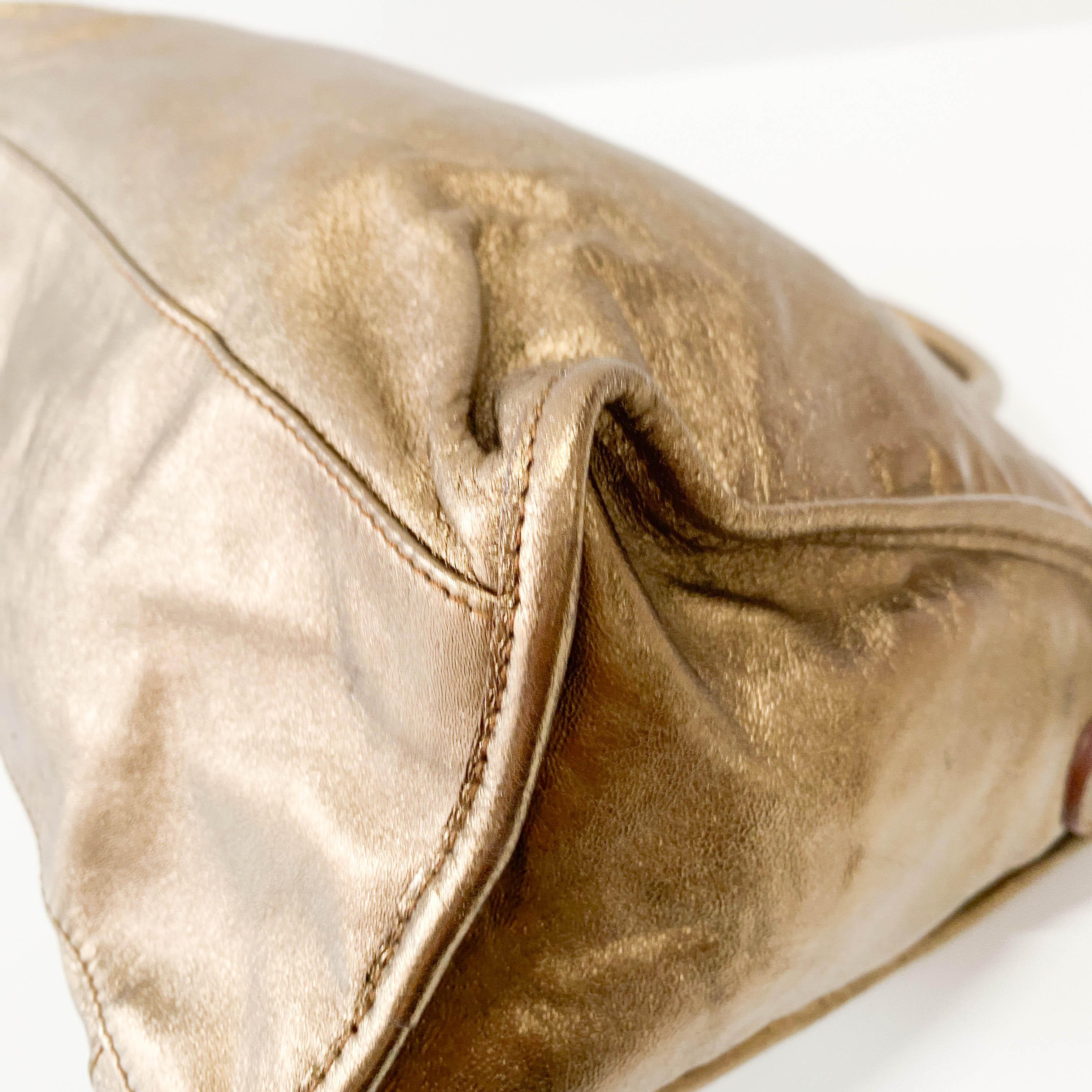The City Gold Leather Hand bag