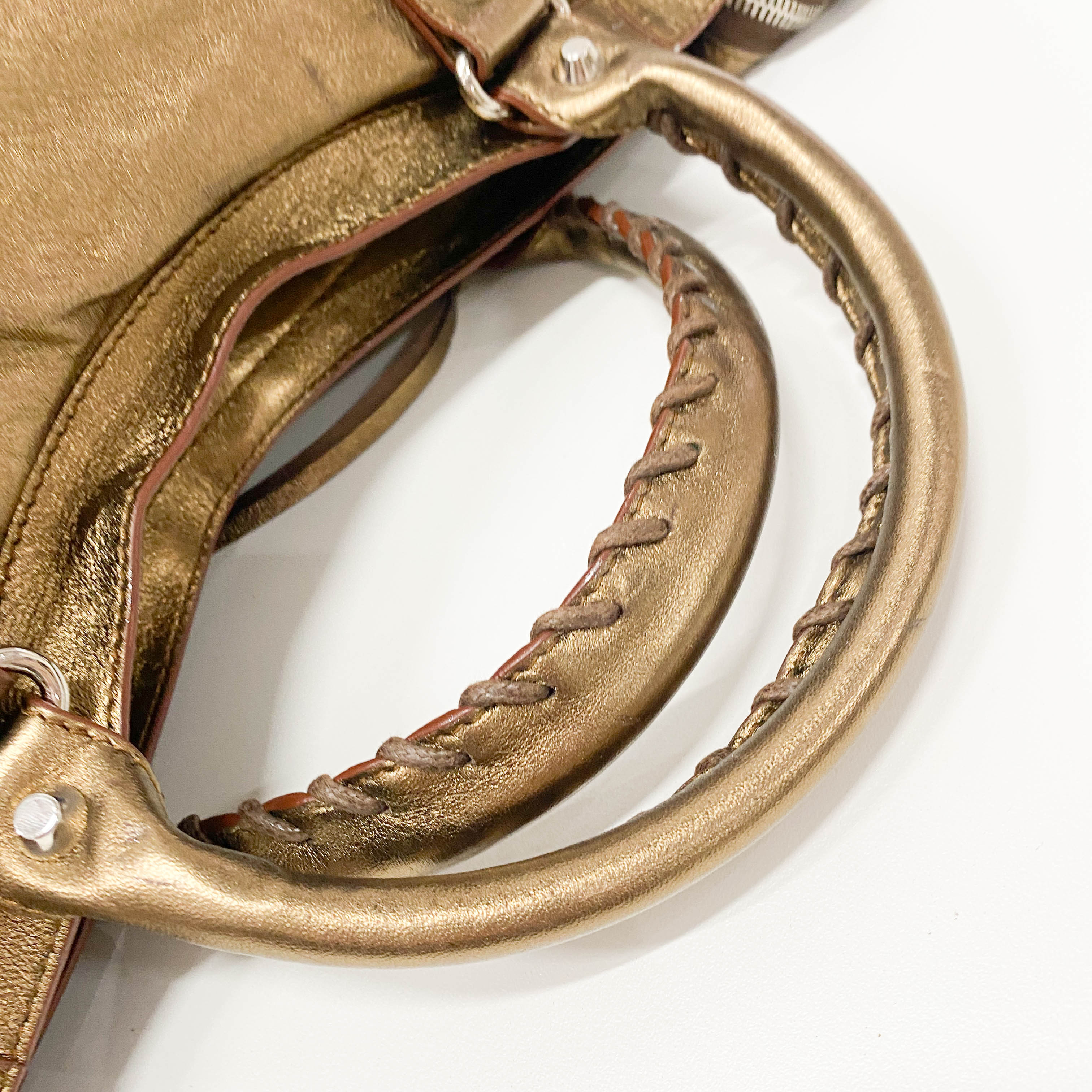 The City Gold Leather Hand bag