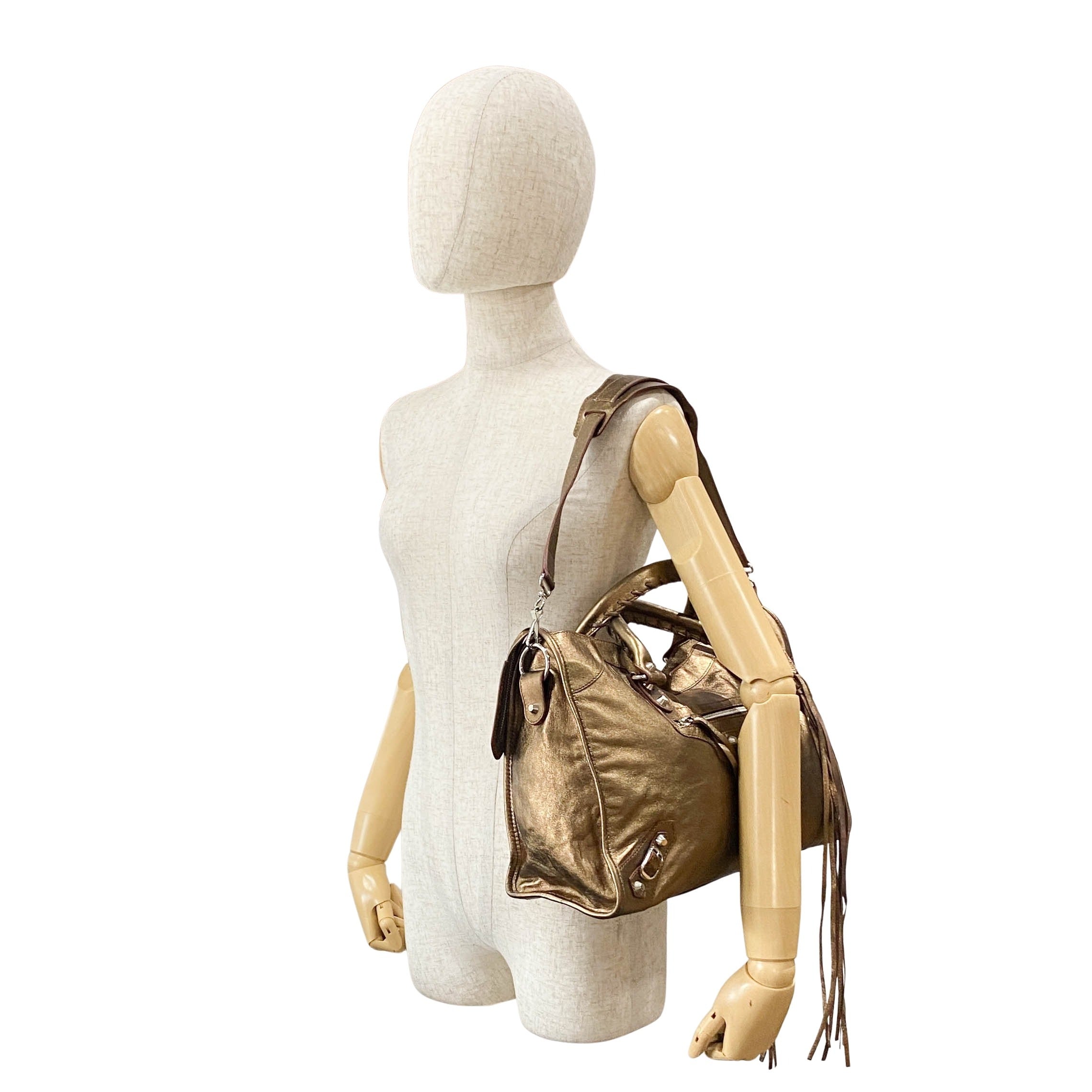 The City Gold Leather Hand bag