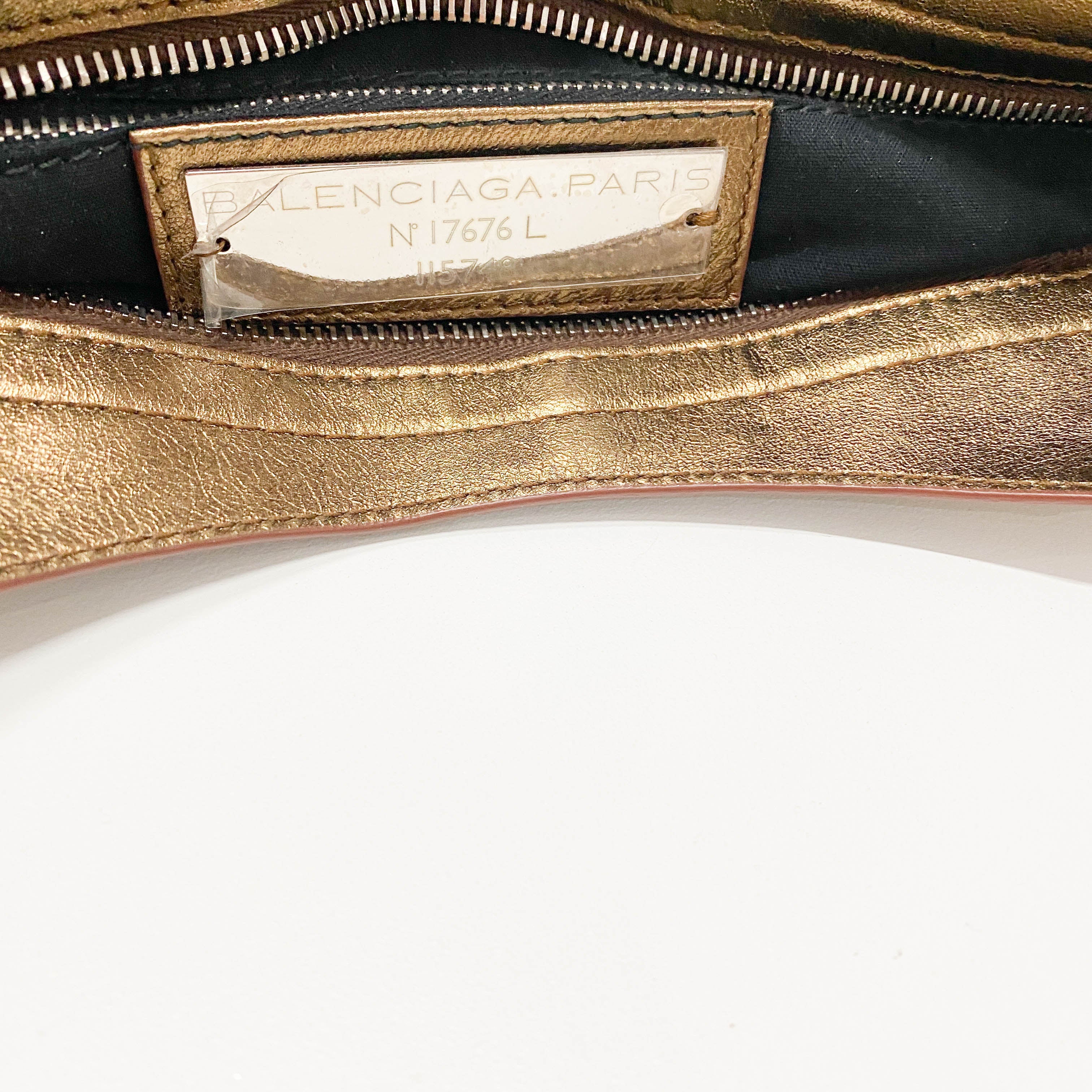 The City Gold Leather Hand bag