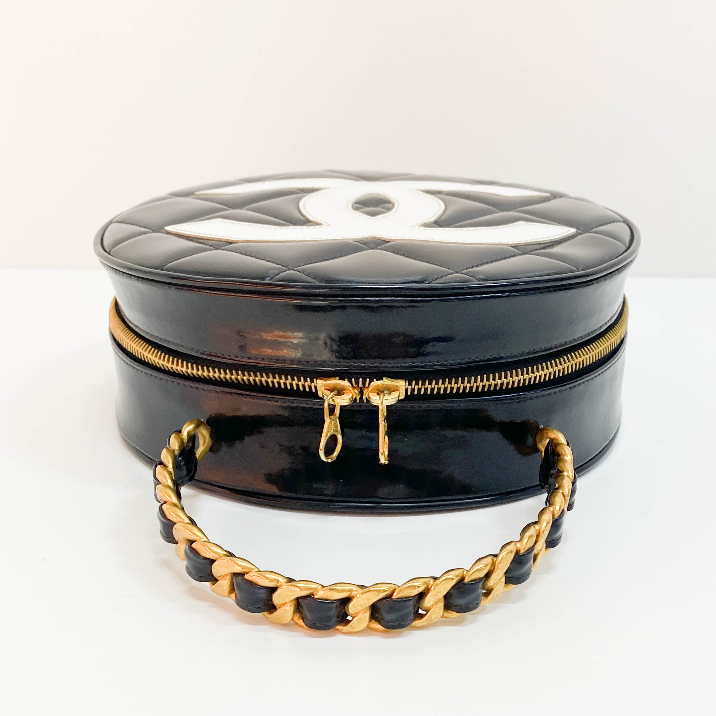 Black Matelassé Round Vanity Bag