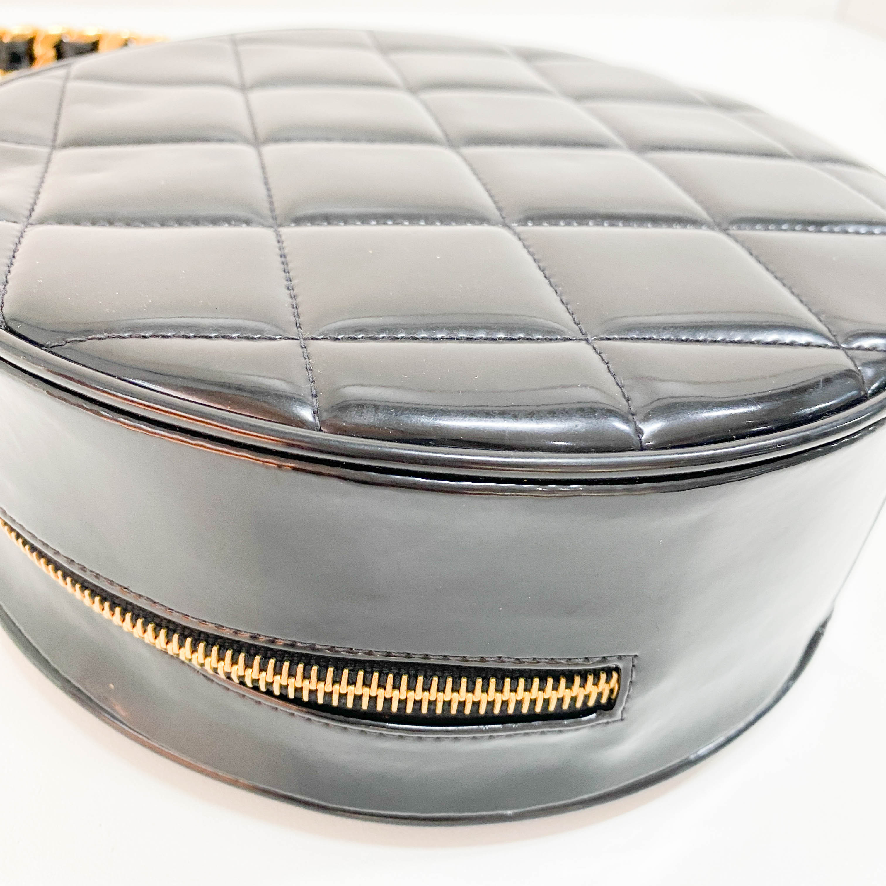 Black Matelassé Round Vanity Bag