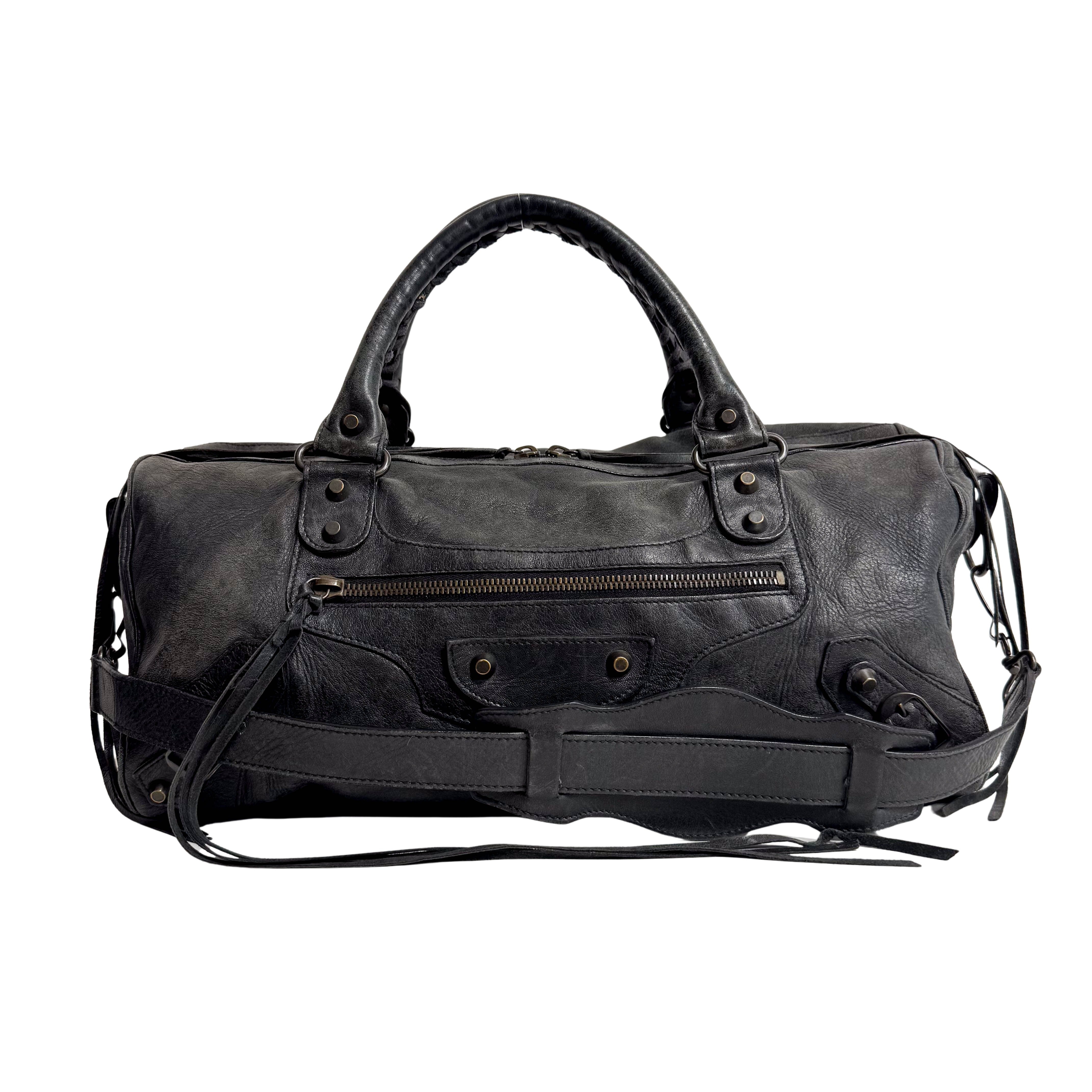 The First Black Leather Hand Bag