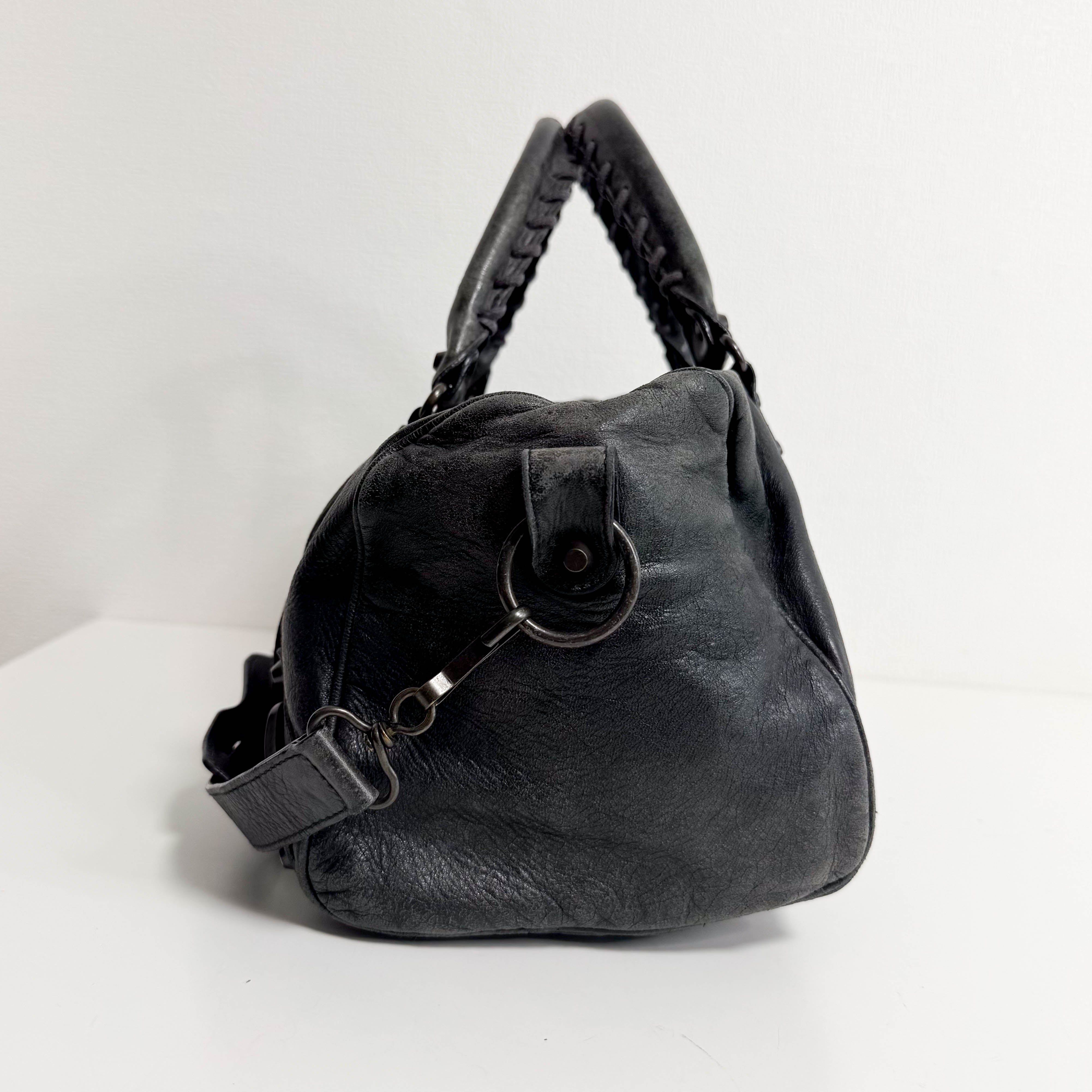The First Black Leather Hand Bag