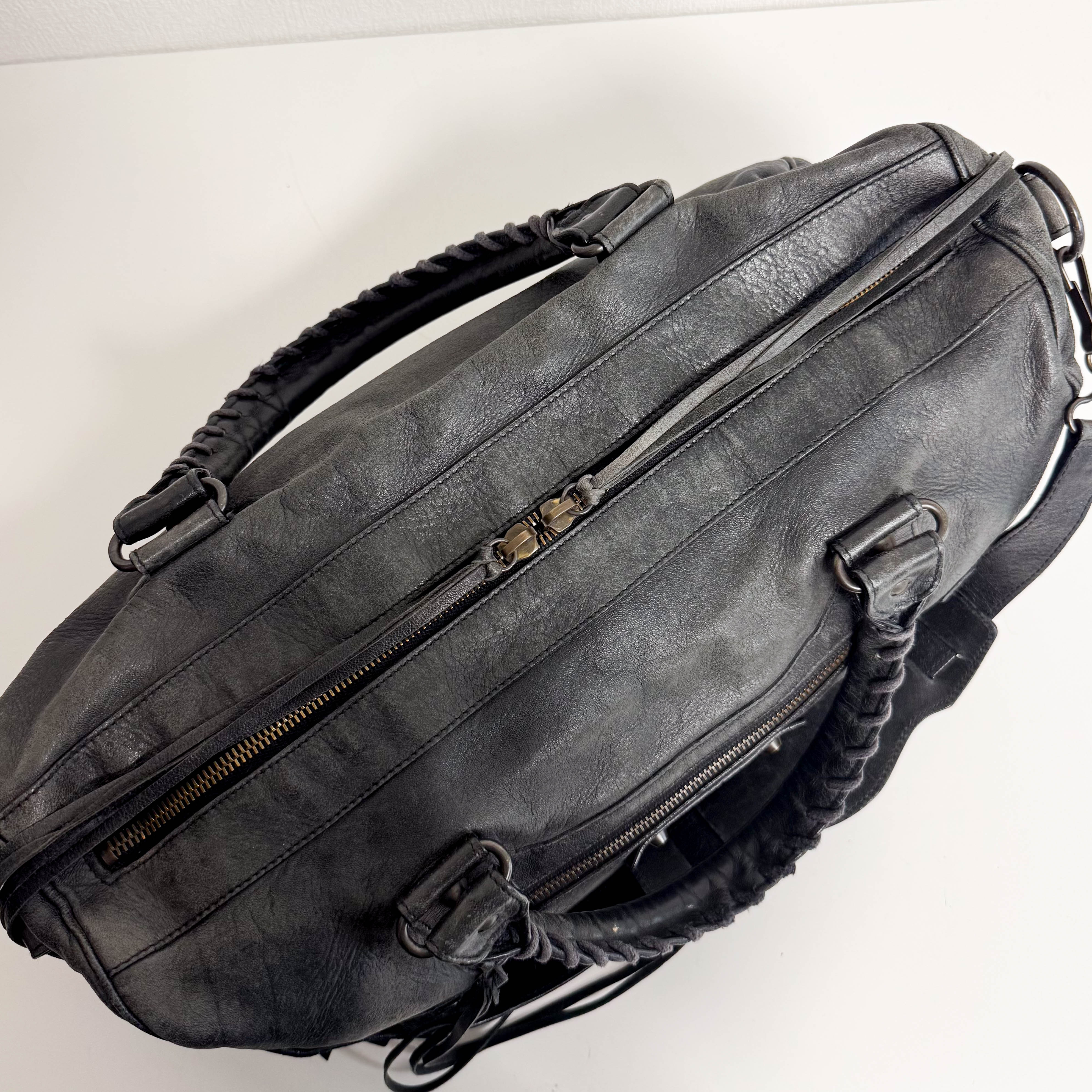 The First Black Leather Hand Bag