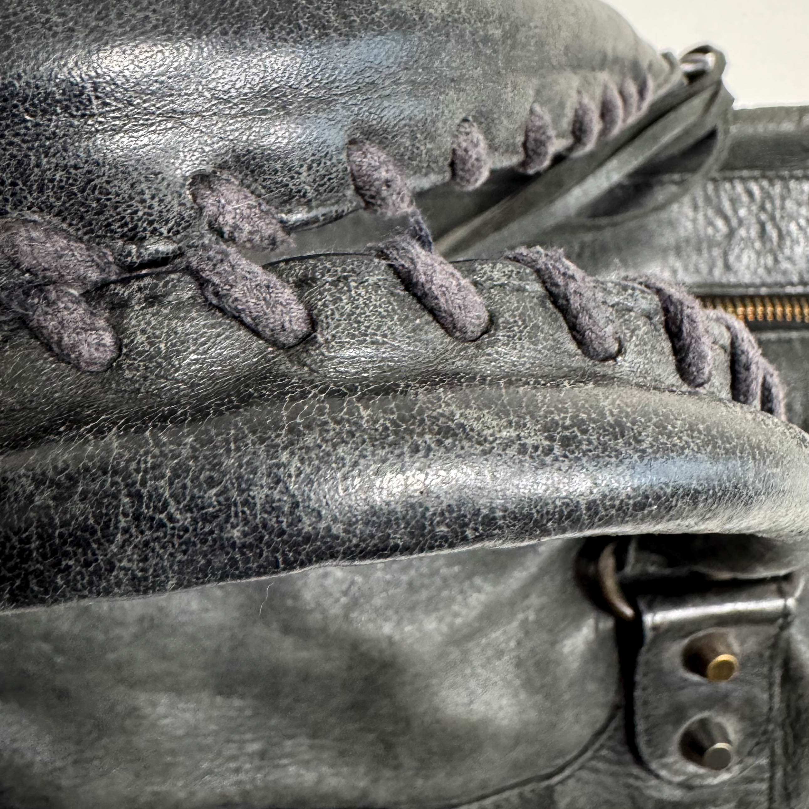 The First Black Leather Hand Bag