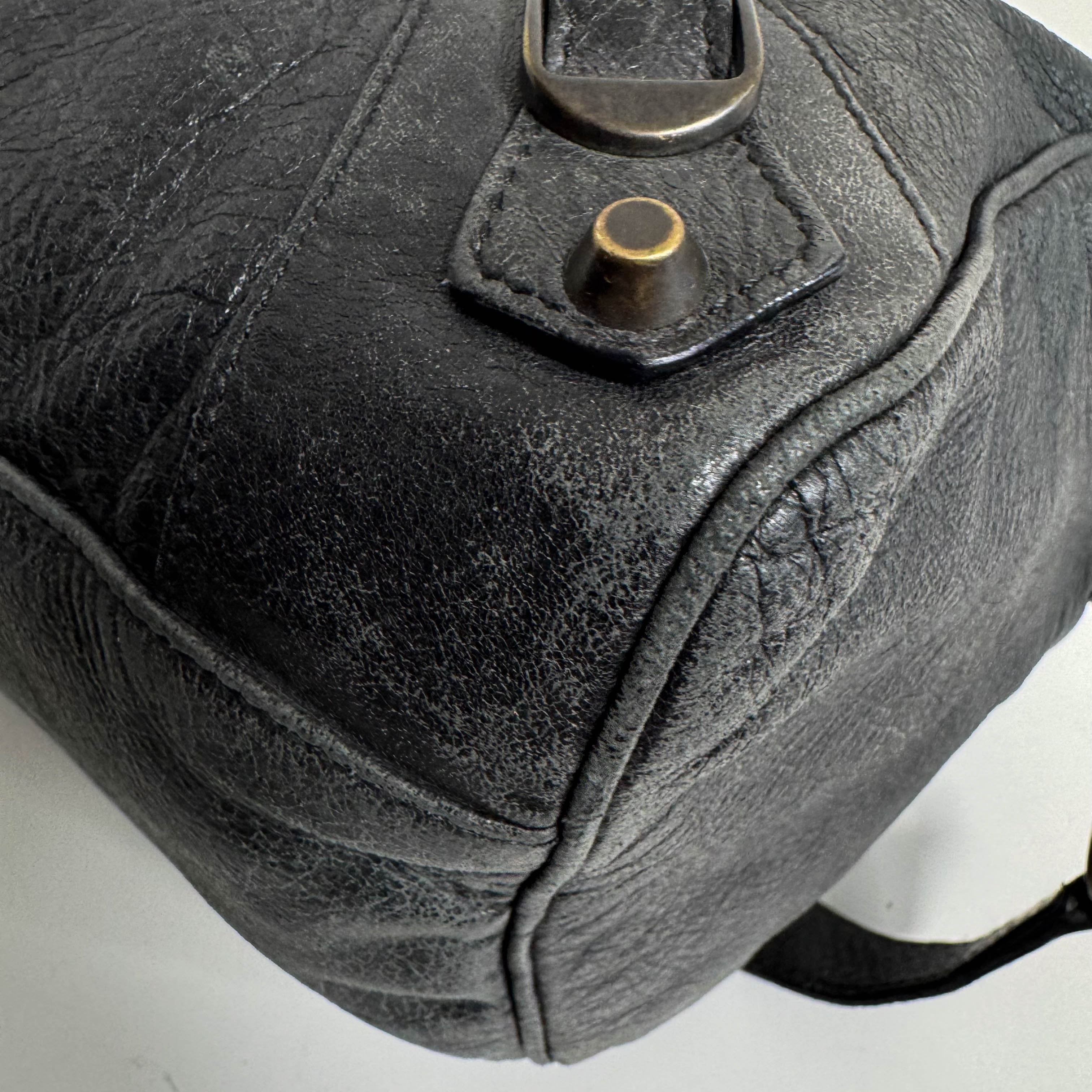 The First Black Leather Hand Bag