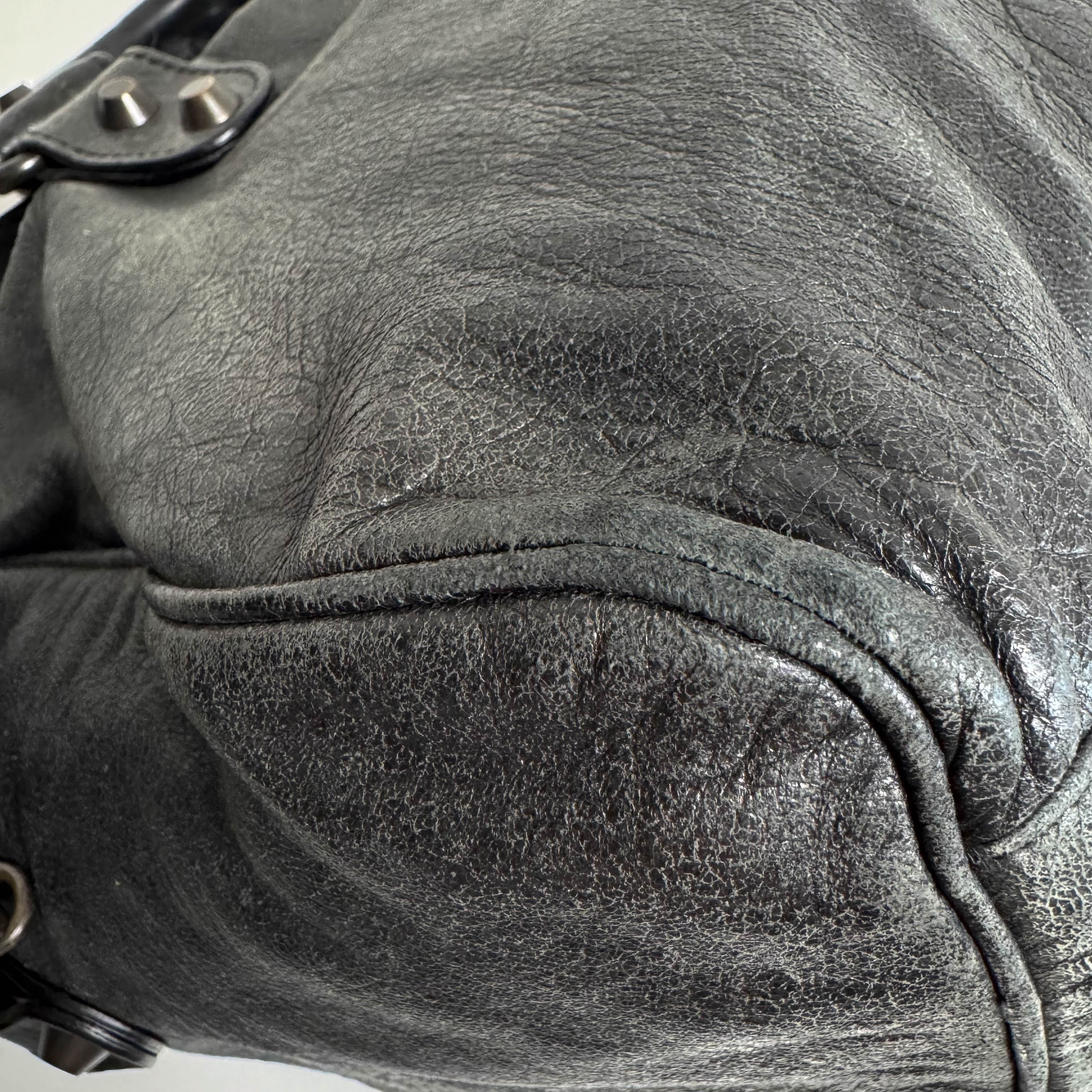 The First Black Leather Hand Bag