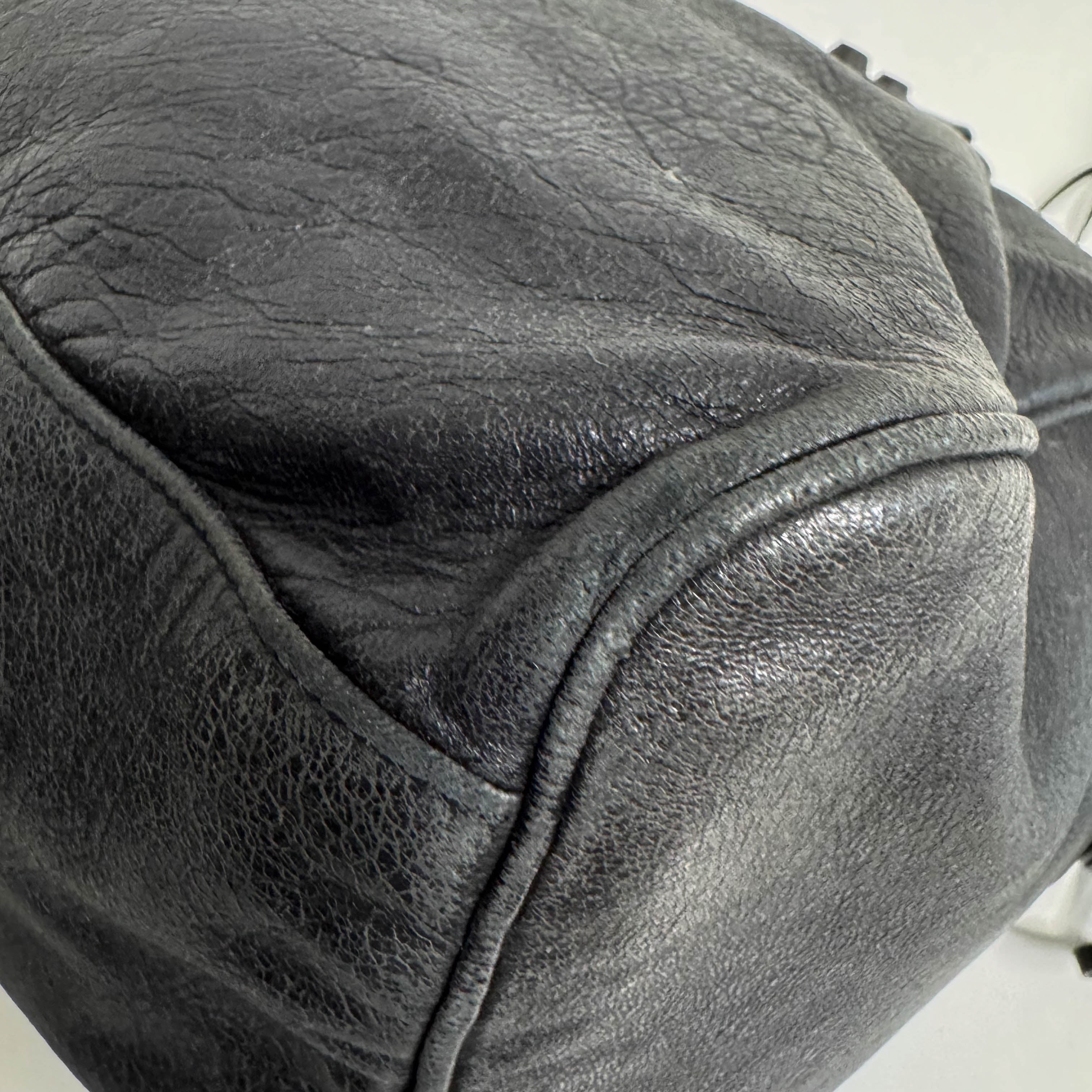 The First Black Leather Hand Bag